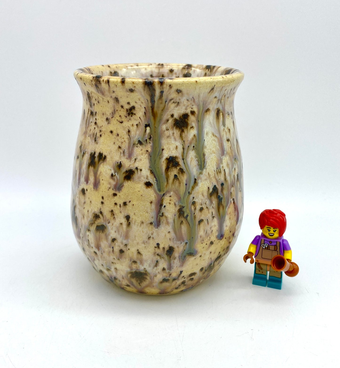 Water beaker in speckled yellows and creams