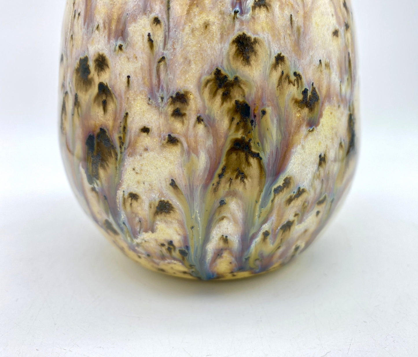 Water beaker in speckled yellows and creams