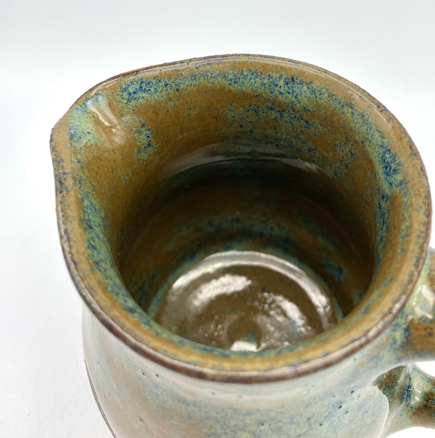 SECOND Jug in rich blues and browns