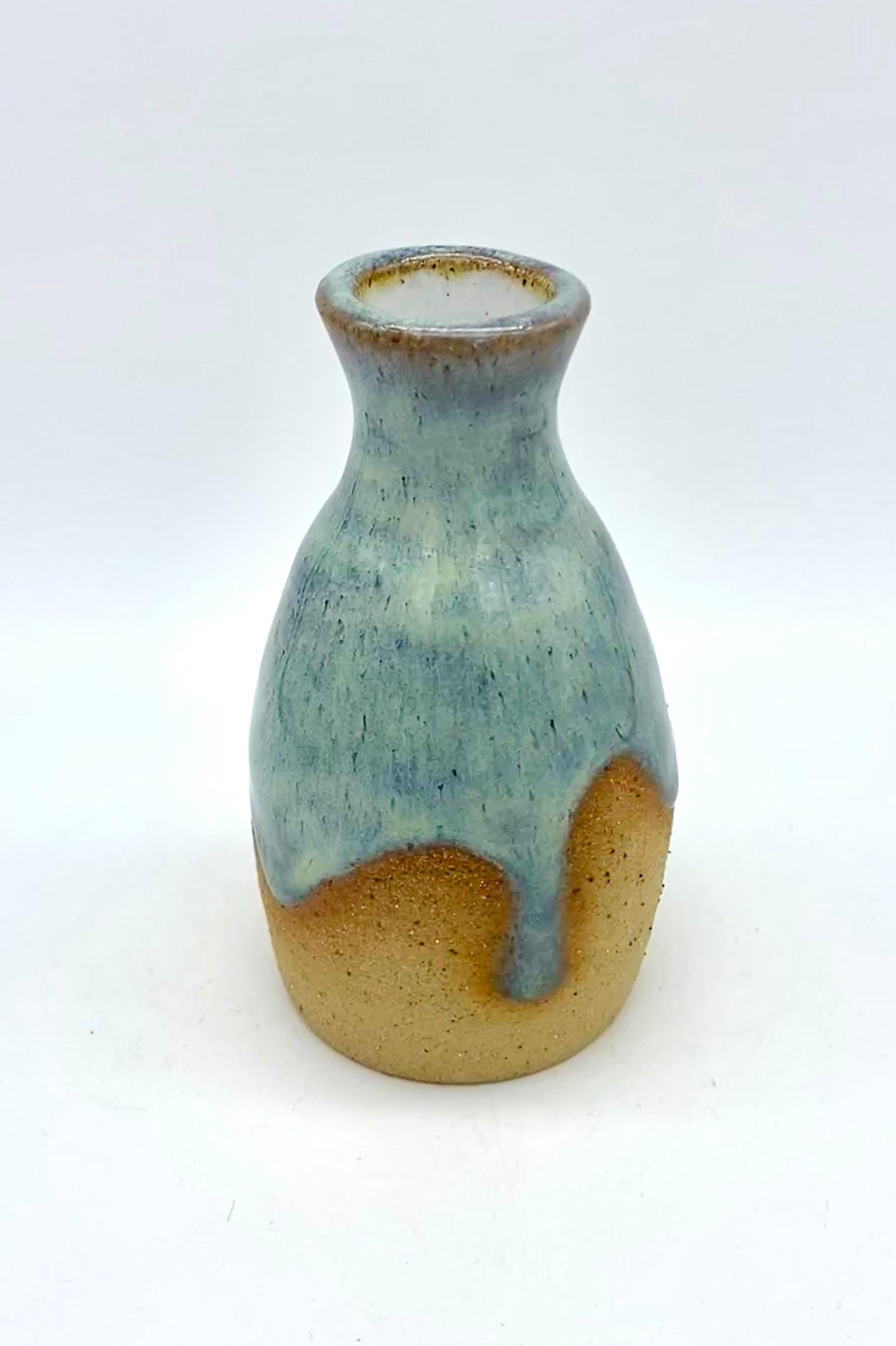 Bud vase in toasty clay with blue green glaze