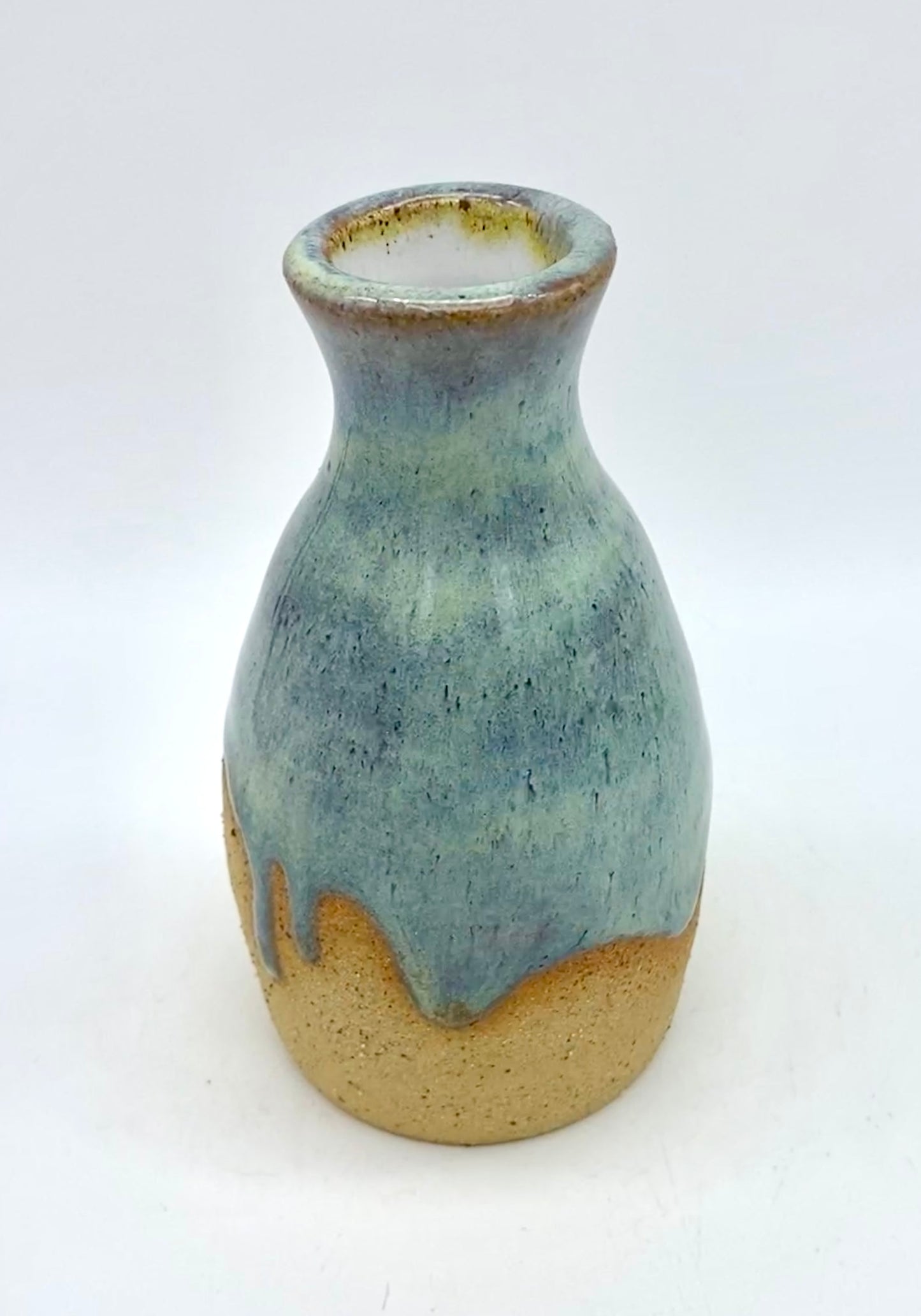 Bud vase in toasty clay with blue green glaze