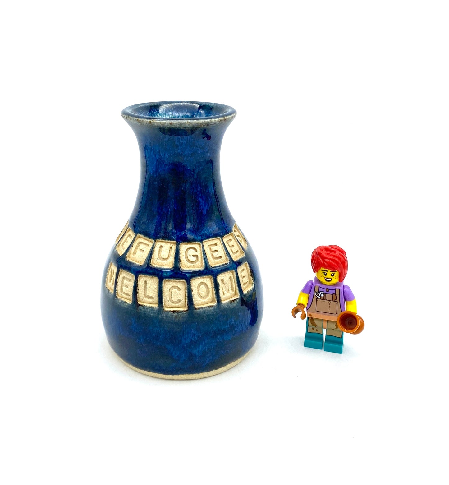 'Refugees welcome' bud vase