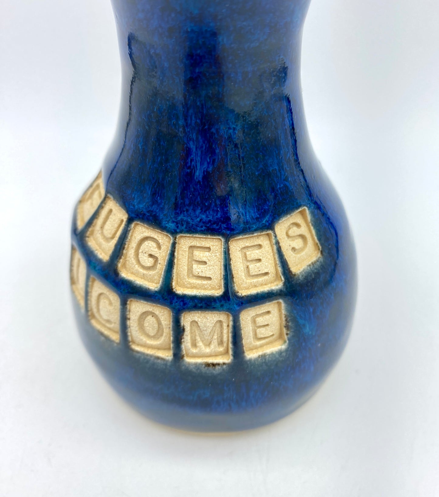 'Refugees welcome' bud vase