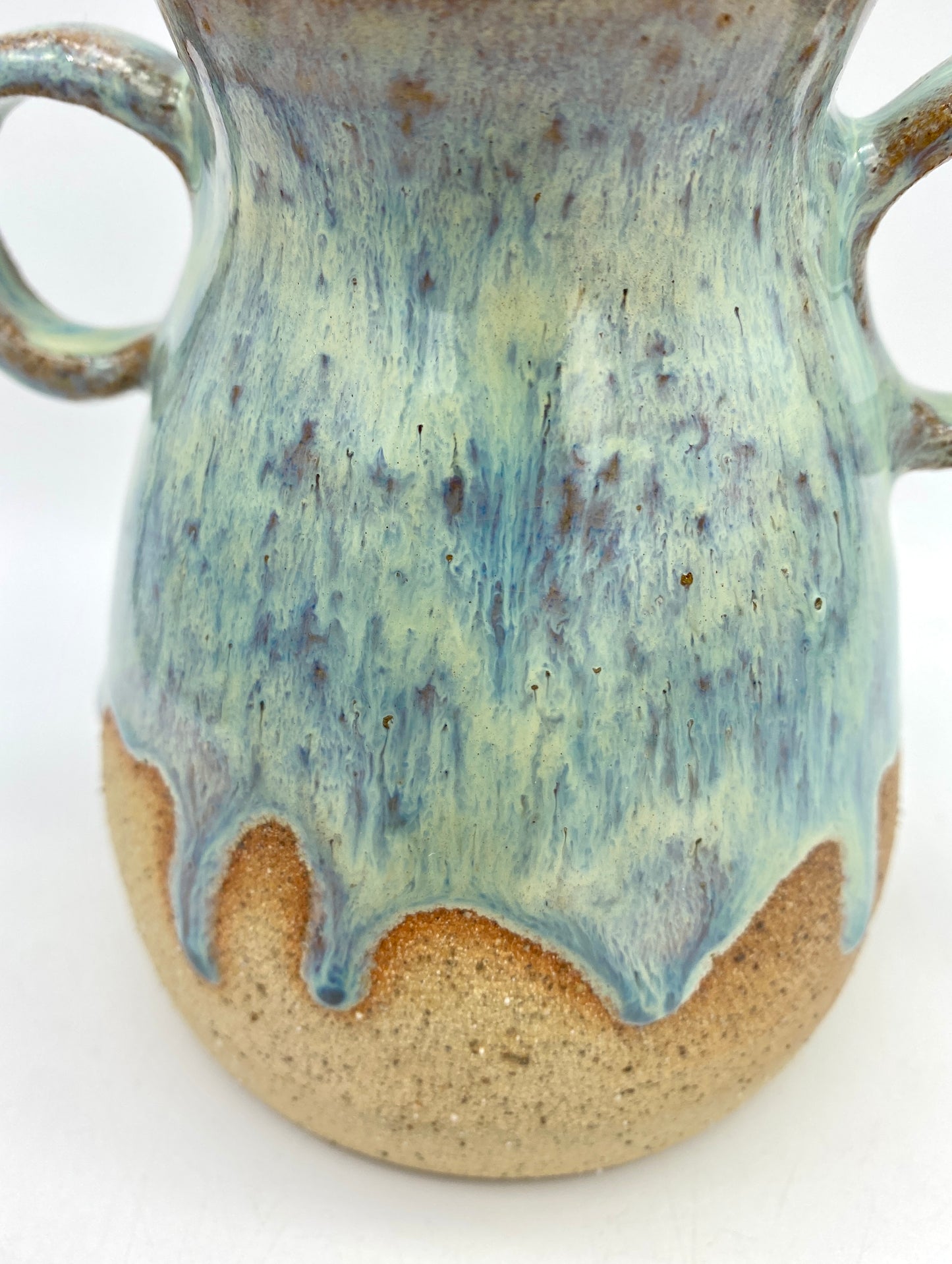 Dreamy double-handed vase in toasty clay