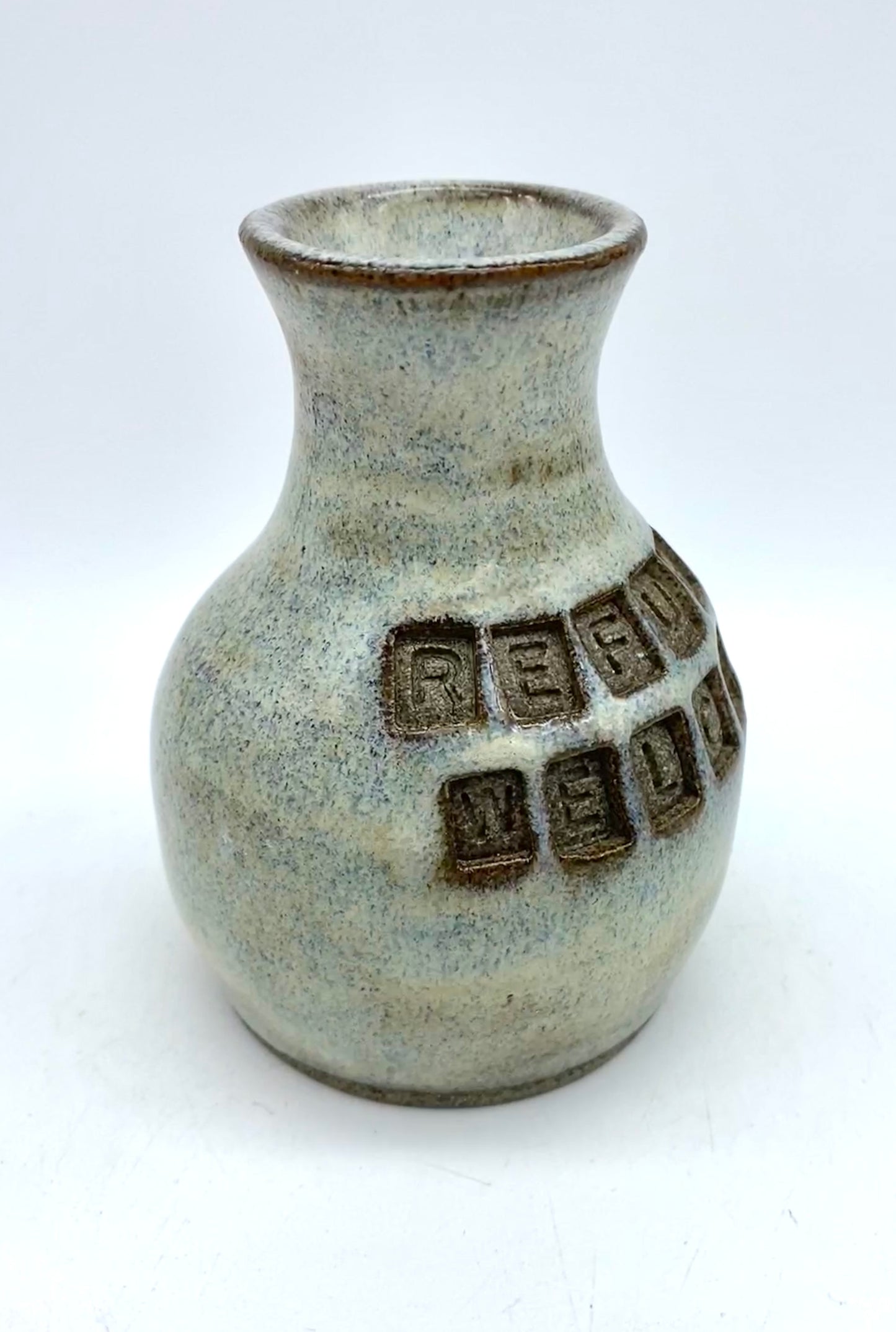 'Refugees welcome' little bud vase in special Scandi clay