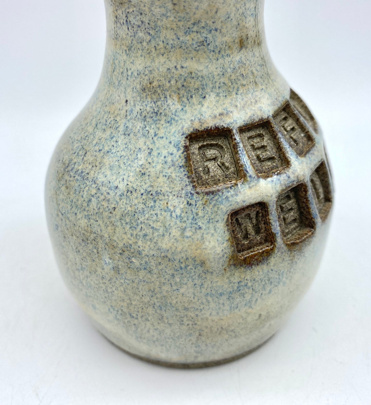 'Refugees welcome' little bud vase in special Scandi clay