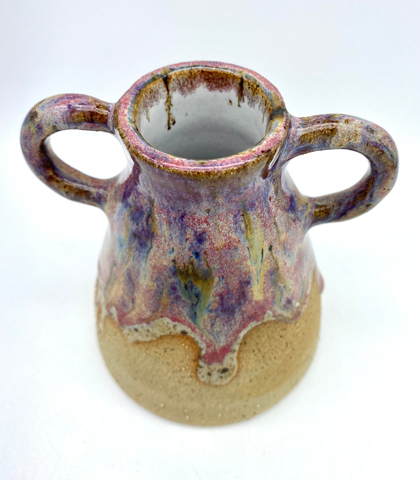 Stunning two-handled vase in toasty clay and purple glazes