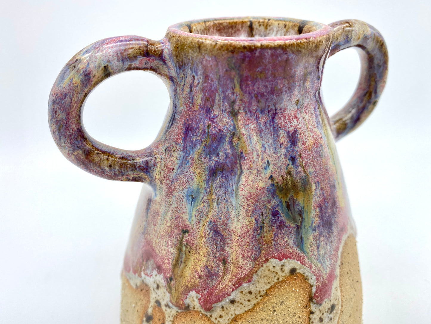 Stunning two-handled vase in toasty clay and purple glazes