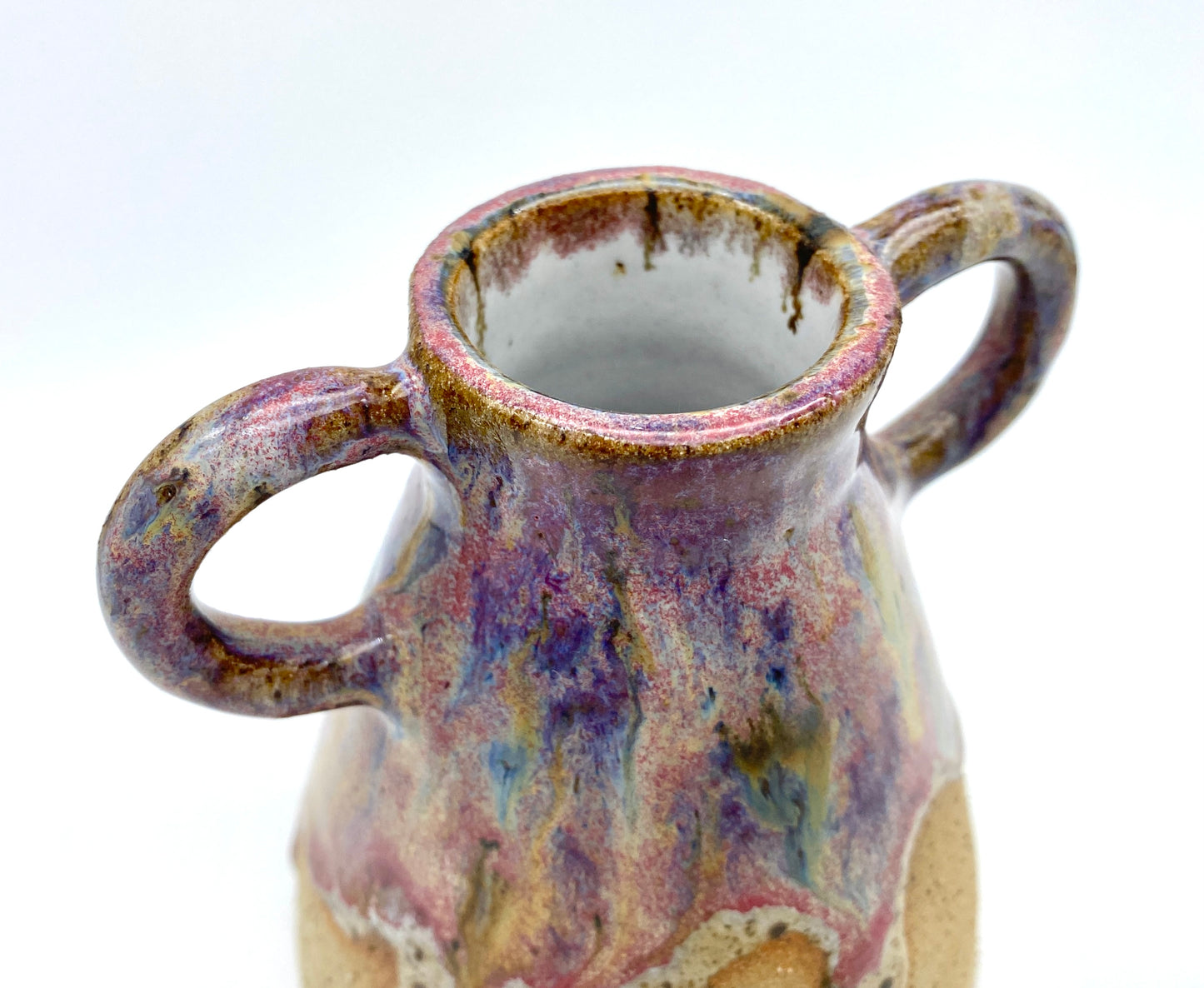 Stunning two-handled vase in toasty clay and purple glazes