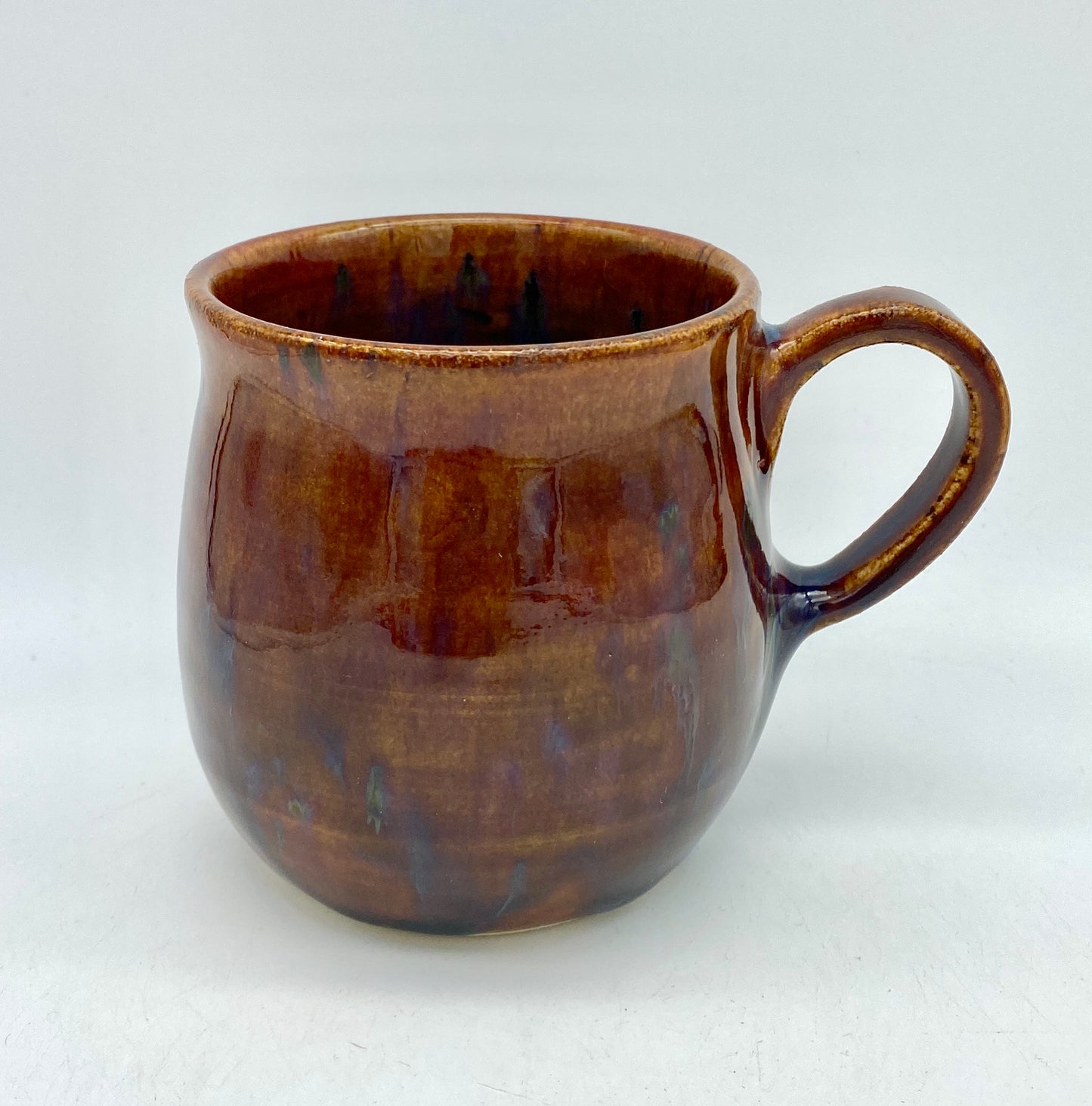 SECOND Small coffee mug in burnt orangey-reds