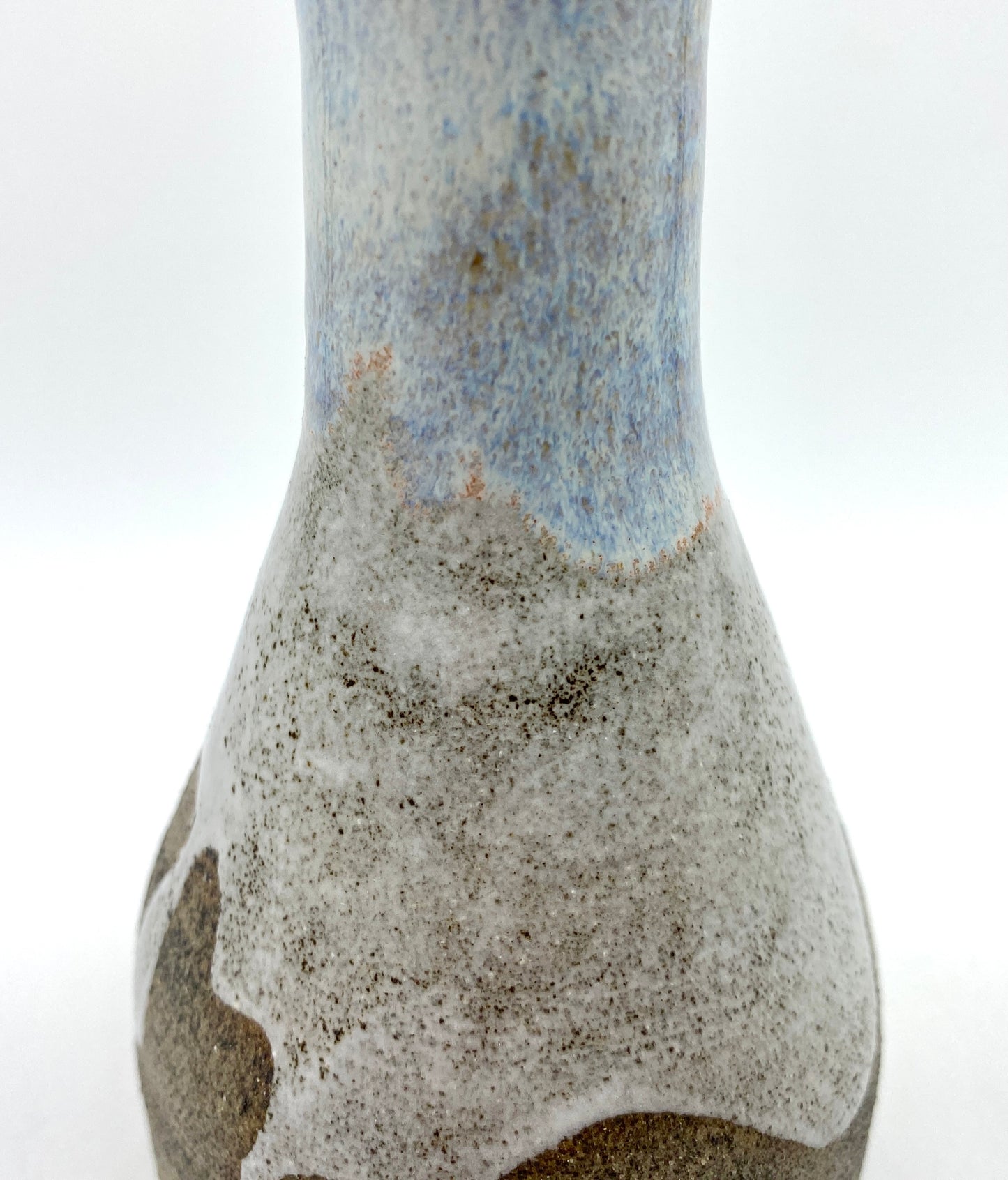 Bud vase in Scandi clay with gentle creamy glazes