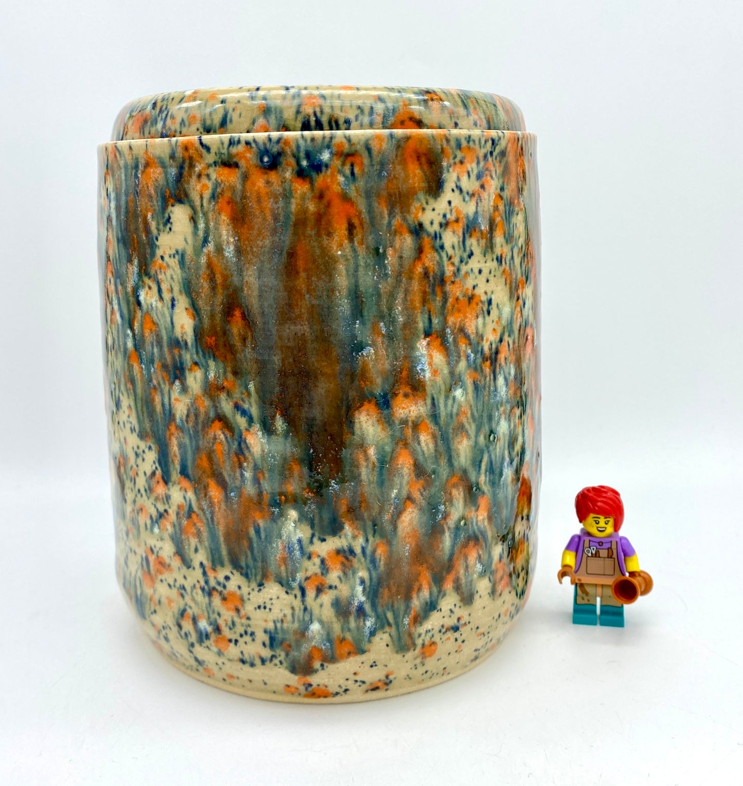 SECOND Large lidded pot in speckled oranges