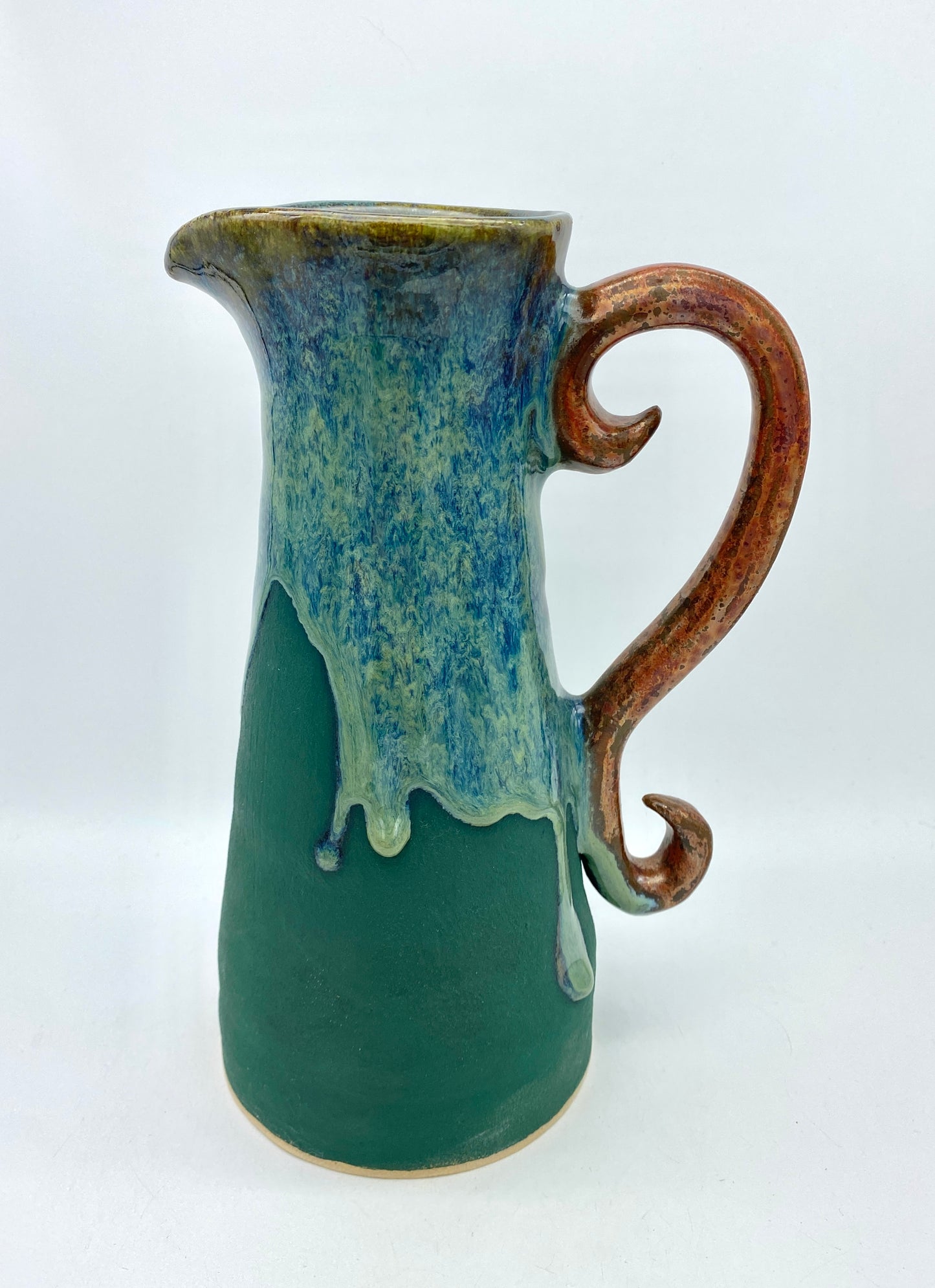 COMMISSION Tall pitcher in greens and copper