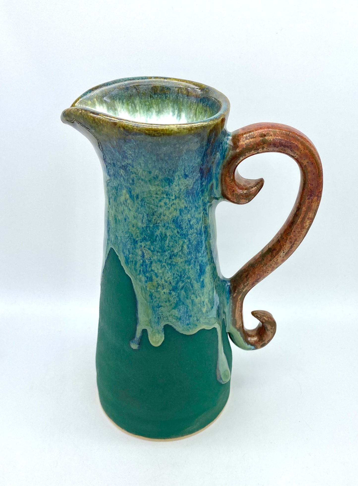 COMMISSION Tall pitcher in greens and copper