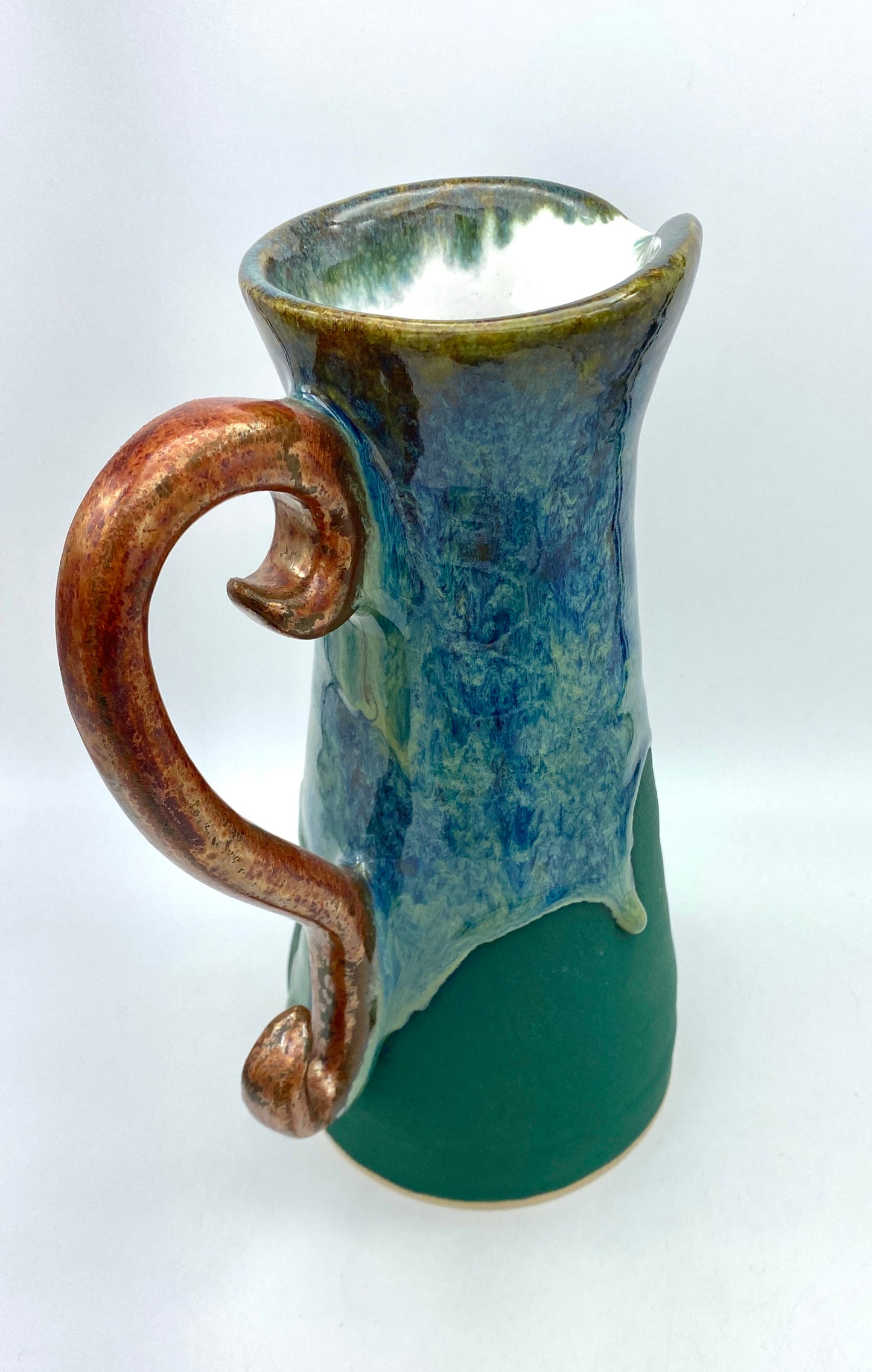 COMMISSION Tall pitcher in greens and copper