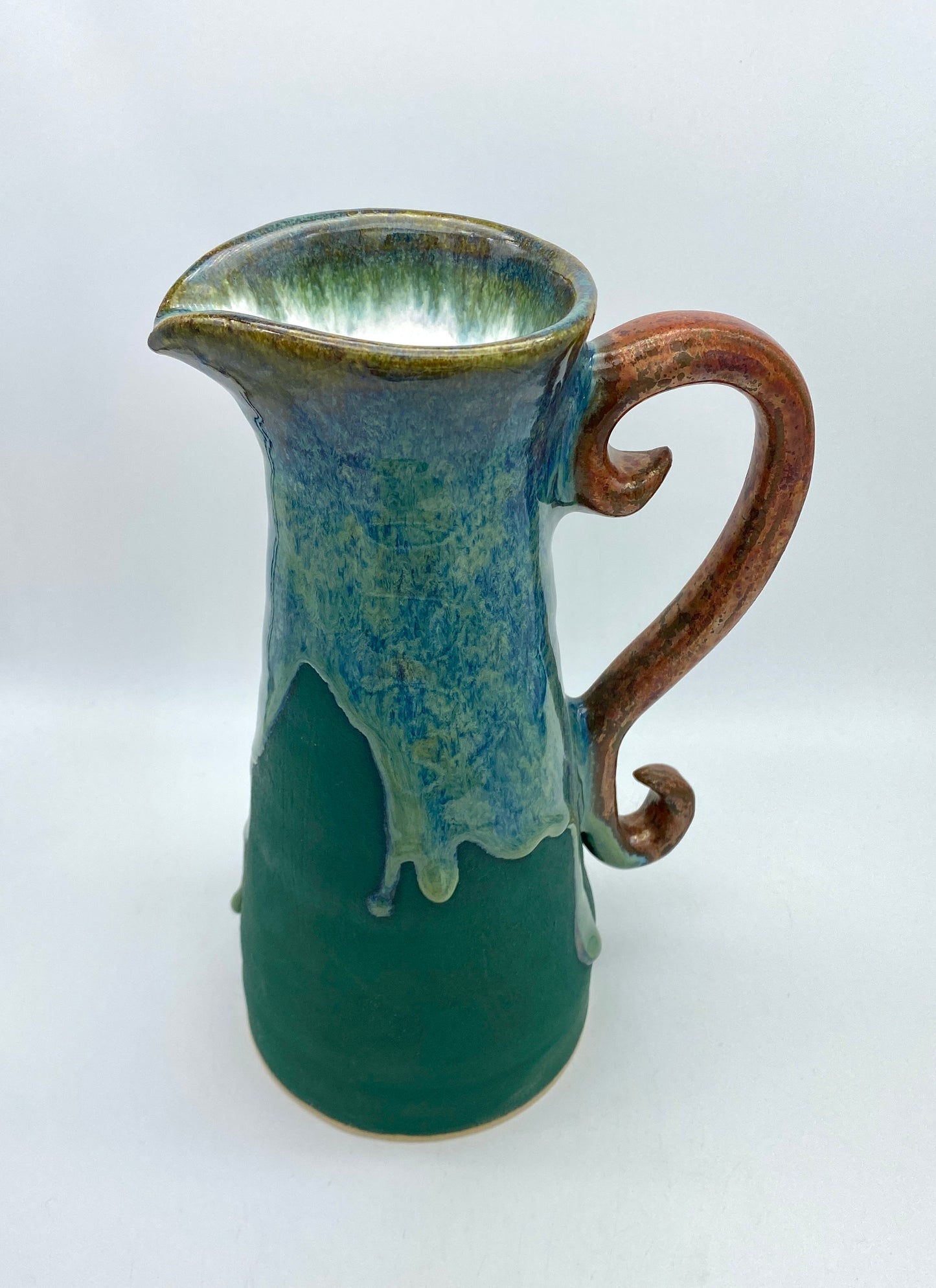 COMMISSION Tall pitcher in greens and copper