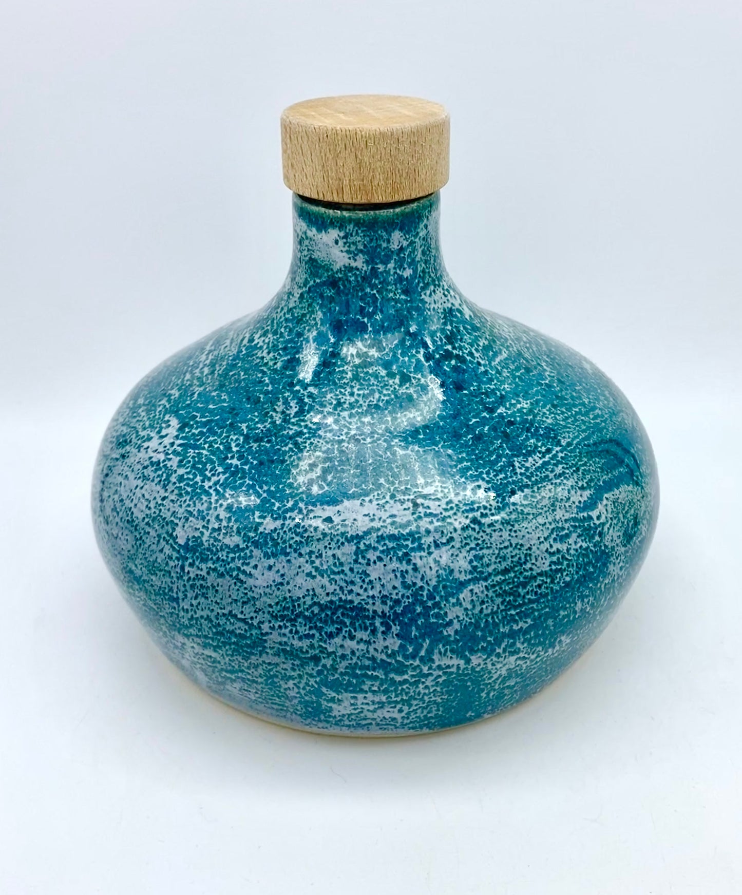 Plump decanter in snow-frosted turquoise