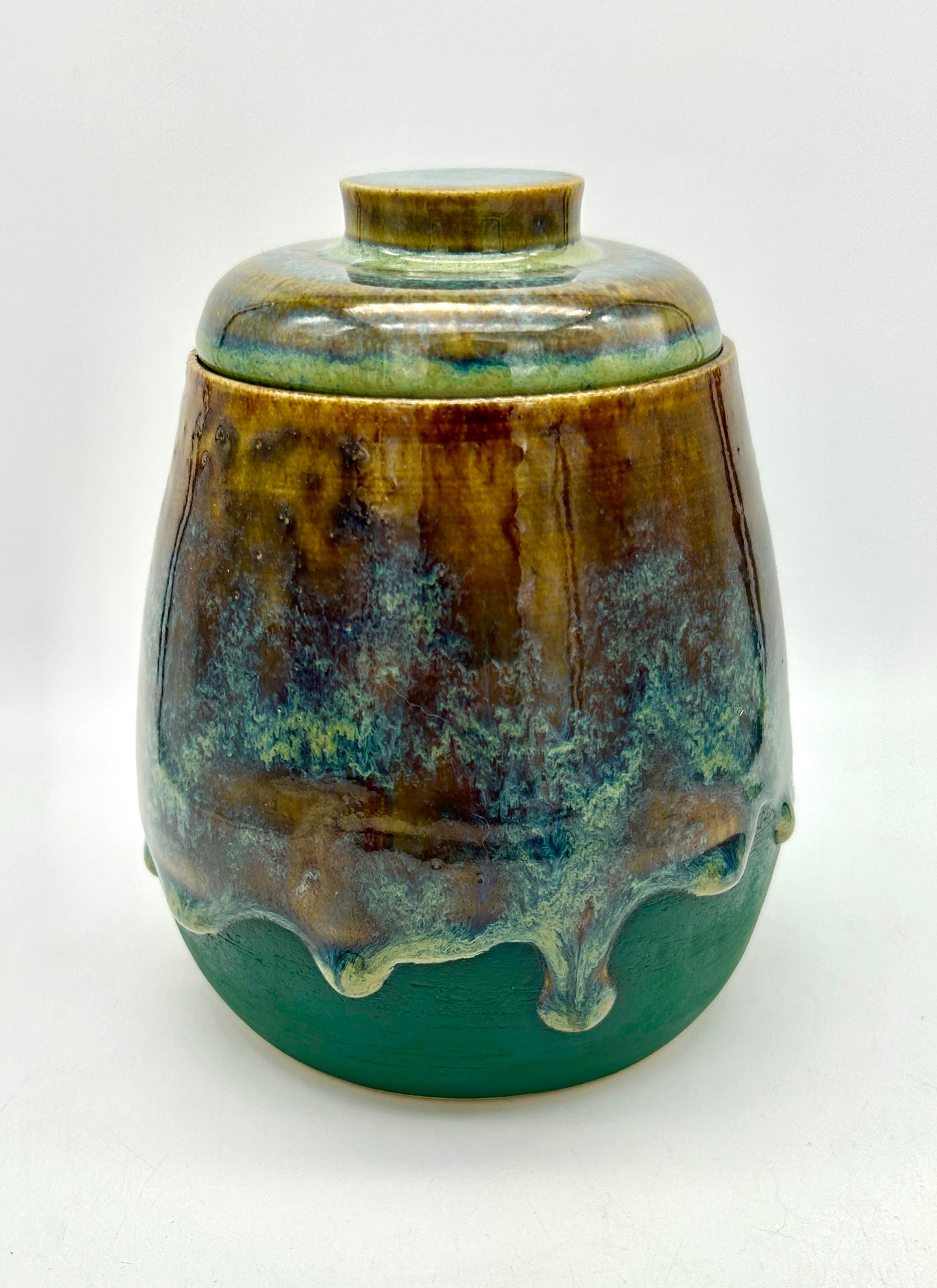 Wonderful 'assorted drugs' lidded jar in flowing greens