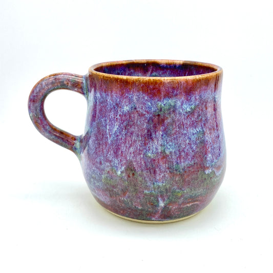 Stunning mug in 'heathery moors' glazes