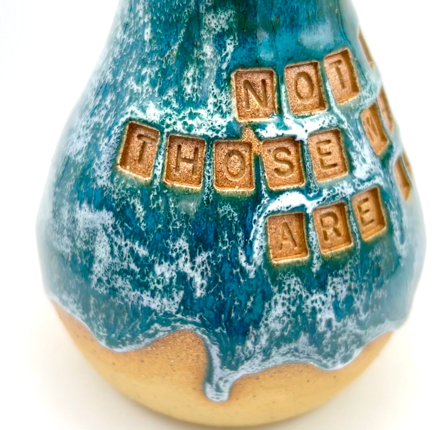 'Not all those who wander are lost' vase in toasty clay