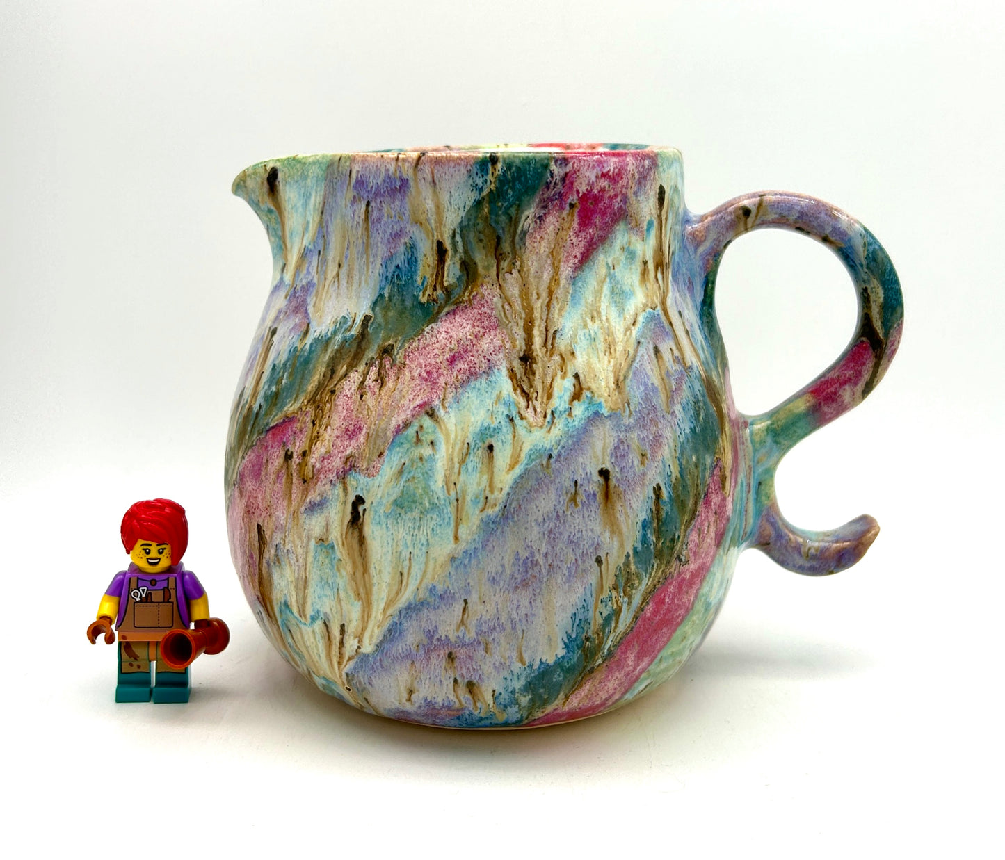 Gorgeous curly jug in my 'aurora' glazes