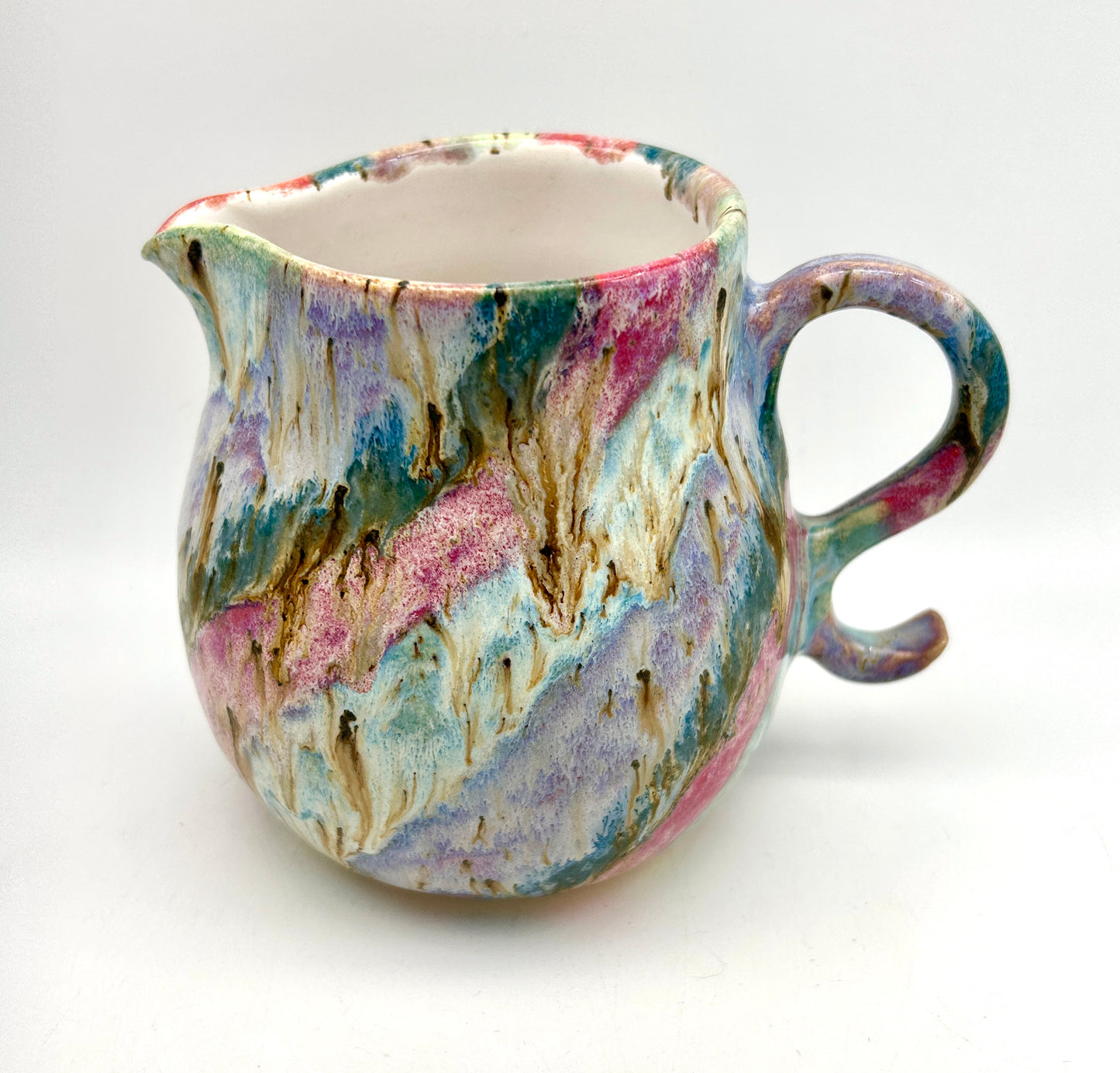 Gorgeous curly jug in my 'aurora' glazes