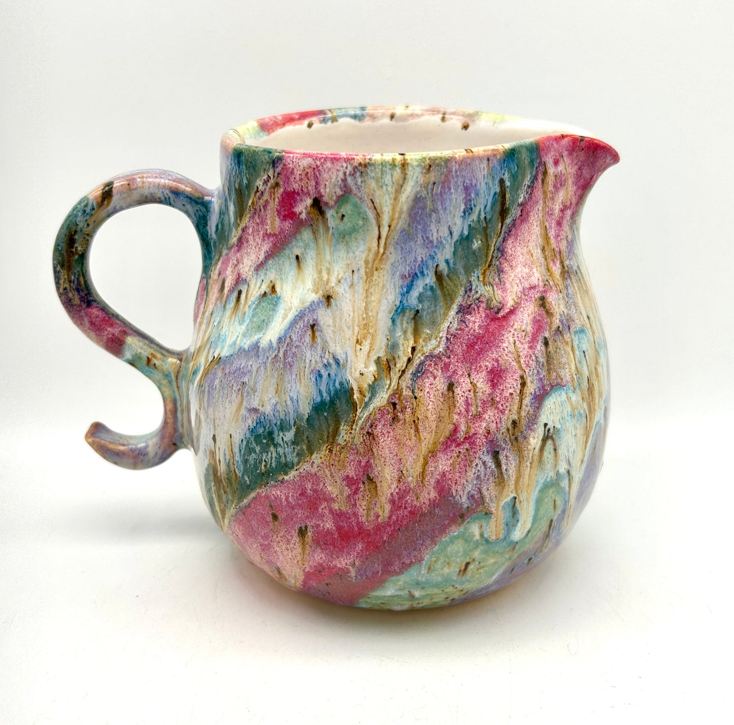 Gorgeous curly jug in my 'aurora' glazes