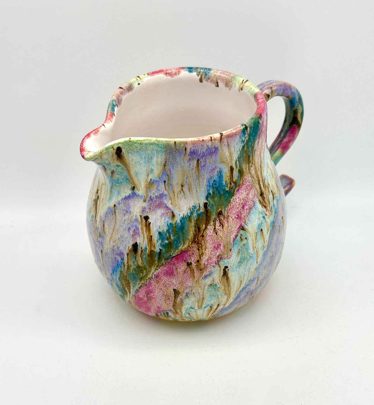 Gorgeous curly jug in my 'aurora' glazes