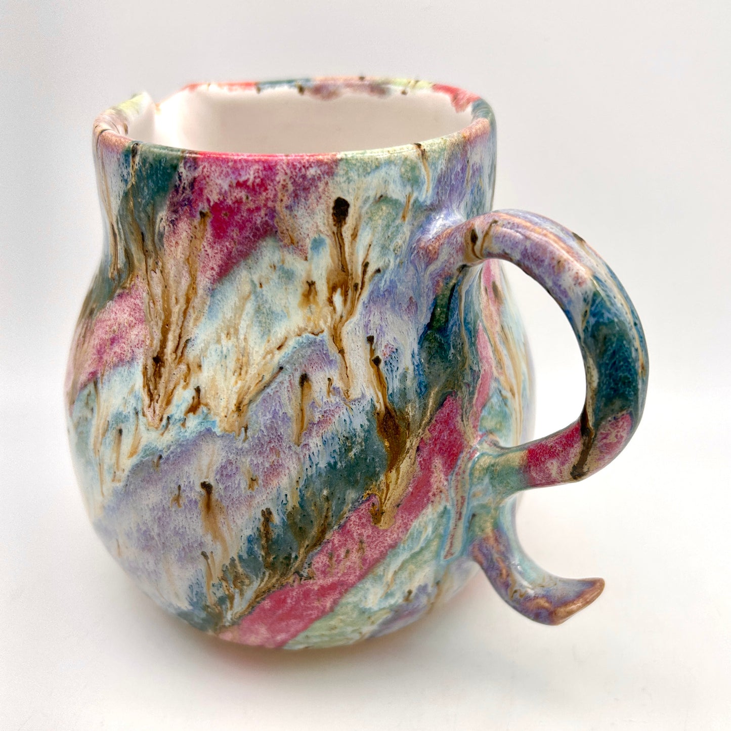 Gorgeous curly jug in my 'aurora' glazes