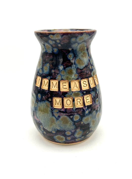 'Immeasurably more' bud vase in galaxy glazes