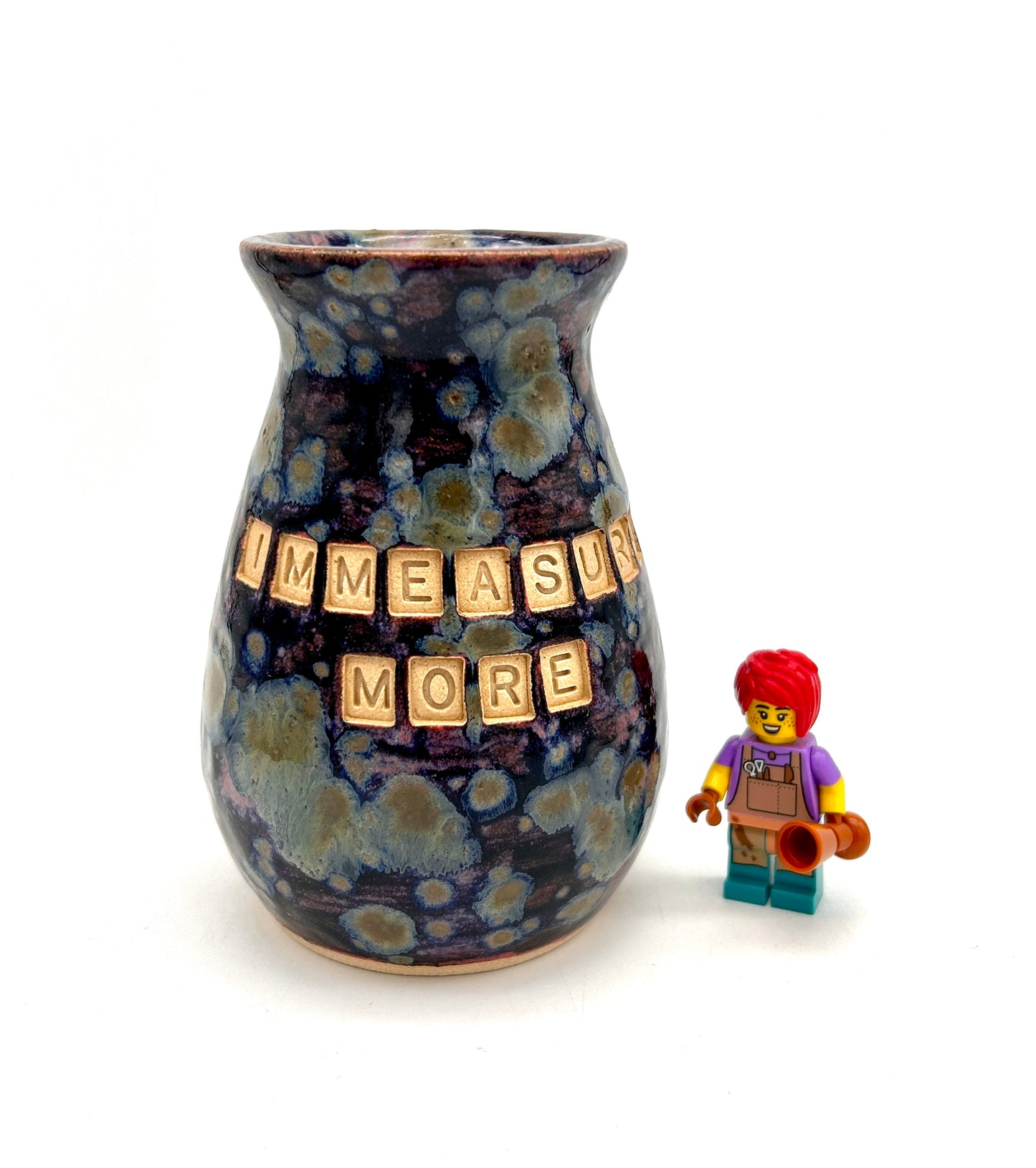 'Immeasurably more' bud vase in galaxy glazes