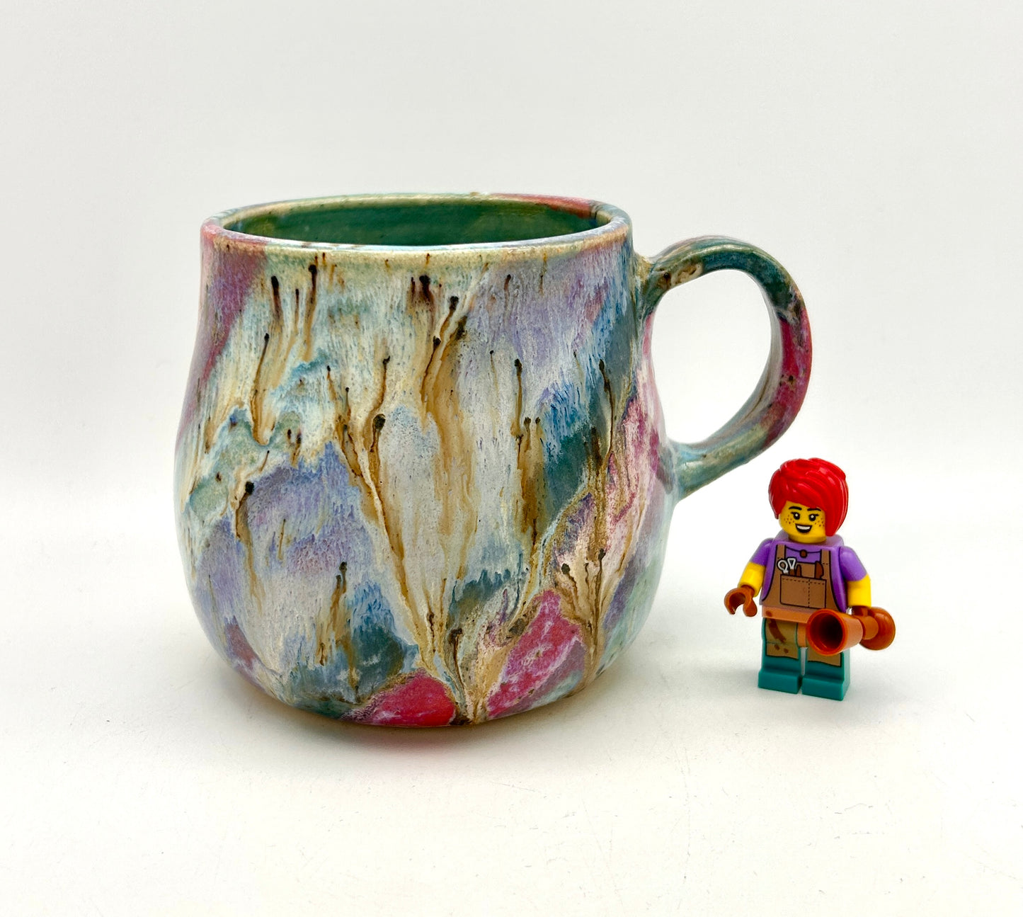 Small mug in my 'aurora' glaze combination