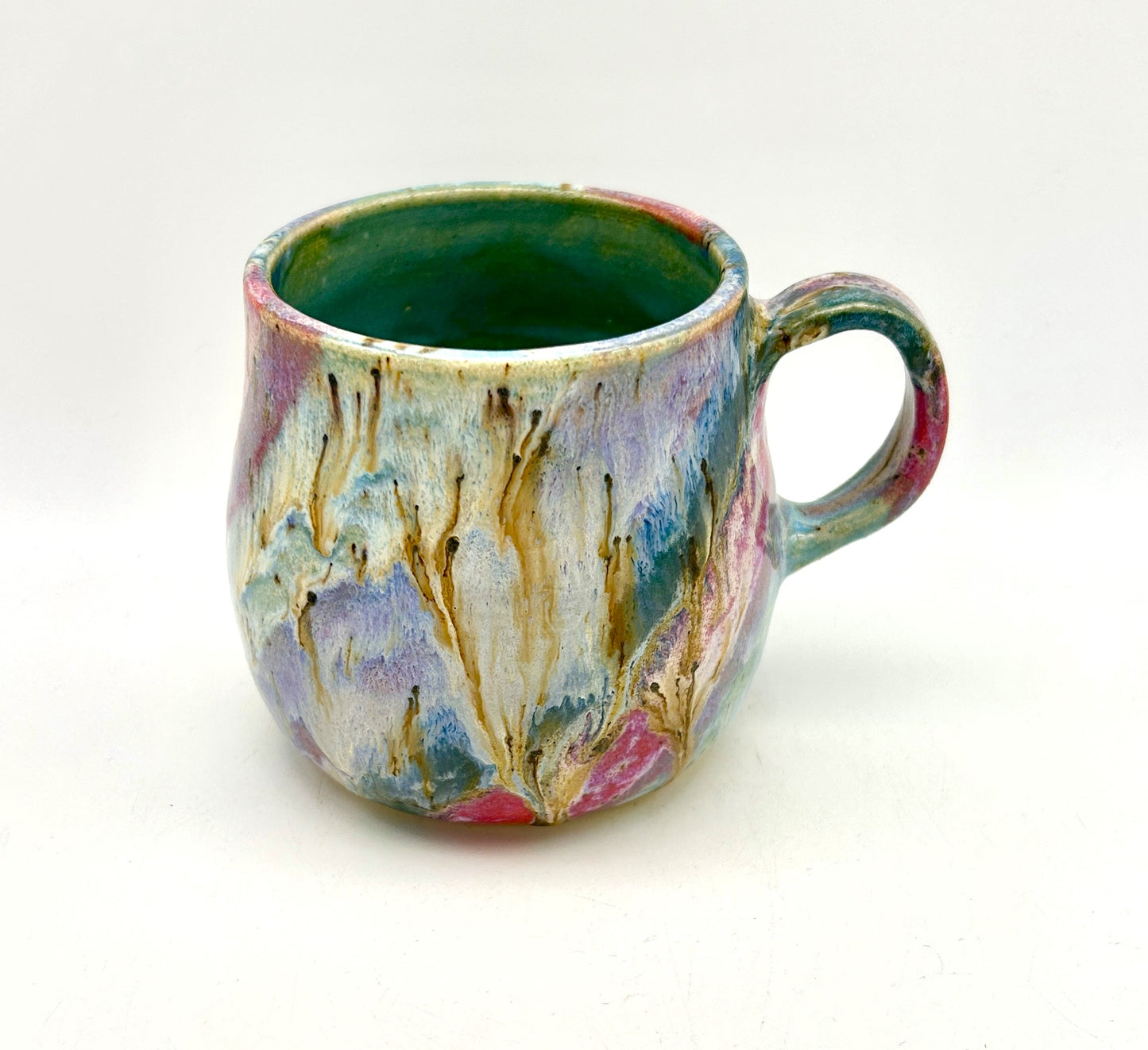 Small mug in my 'aurora' glaze combination