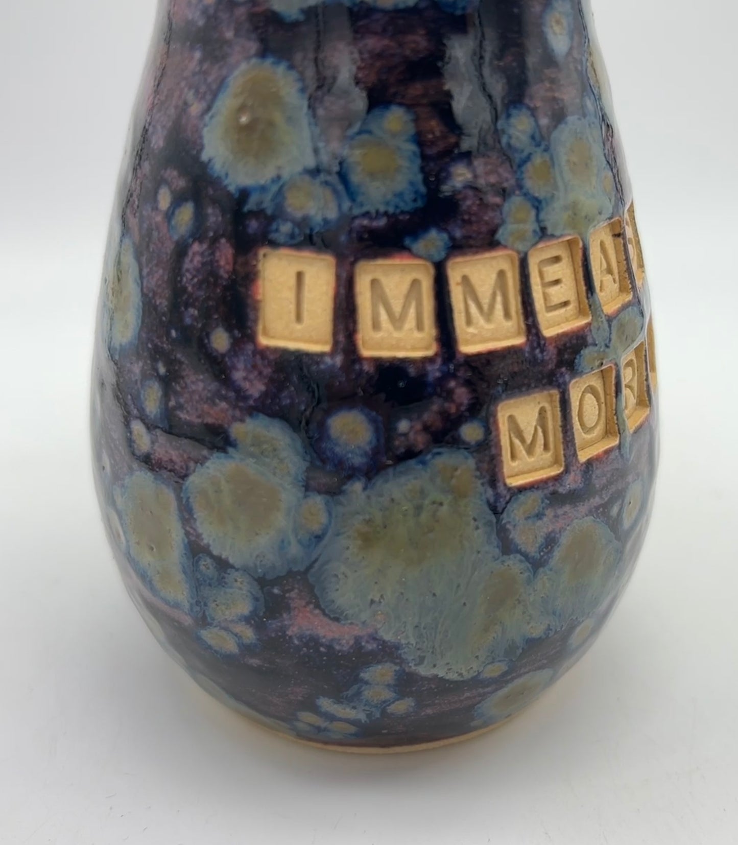 'Immeasurably more' bud vase in galaxy glazes