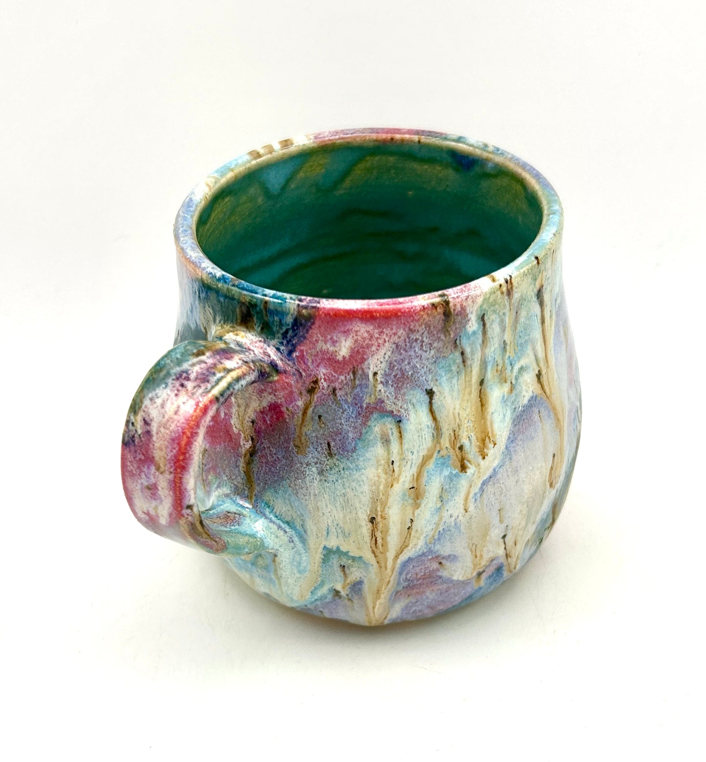 Small mug in my 'aurora' glaze combination