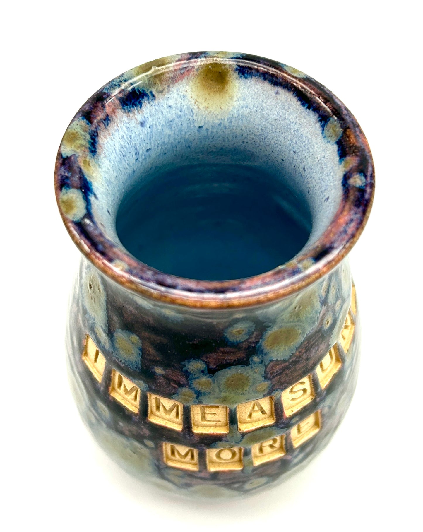 'Immeasurably more' bud vase in galaxy glazes