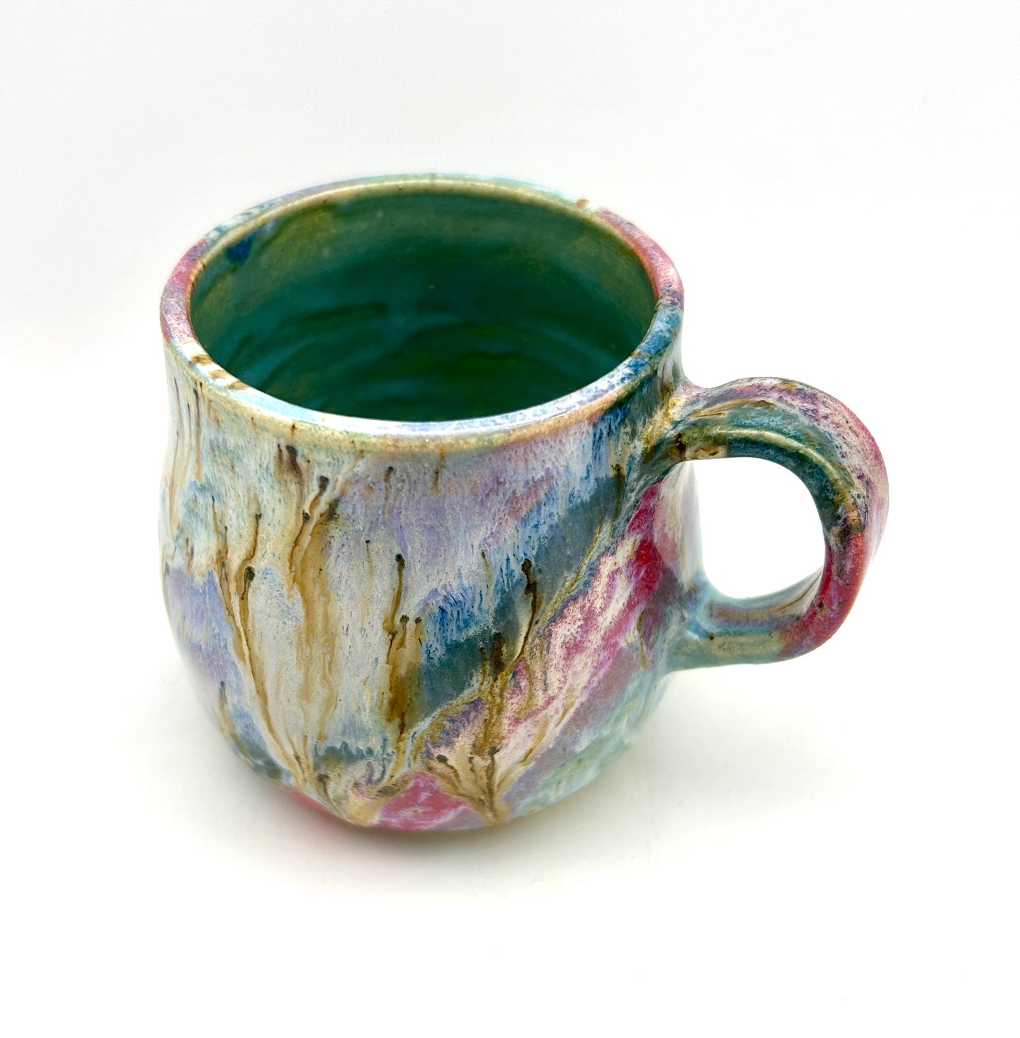 Small mug in my 'aurora' glaze combination