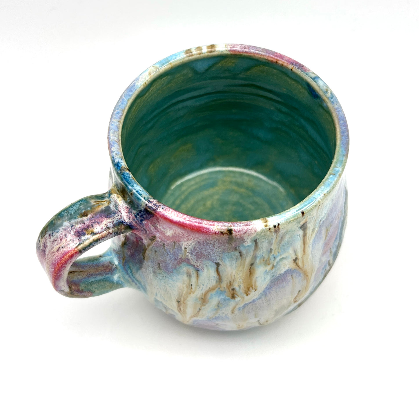 Small mug in my 'aurora' glaze combination