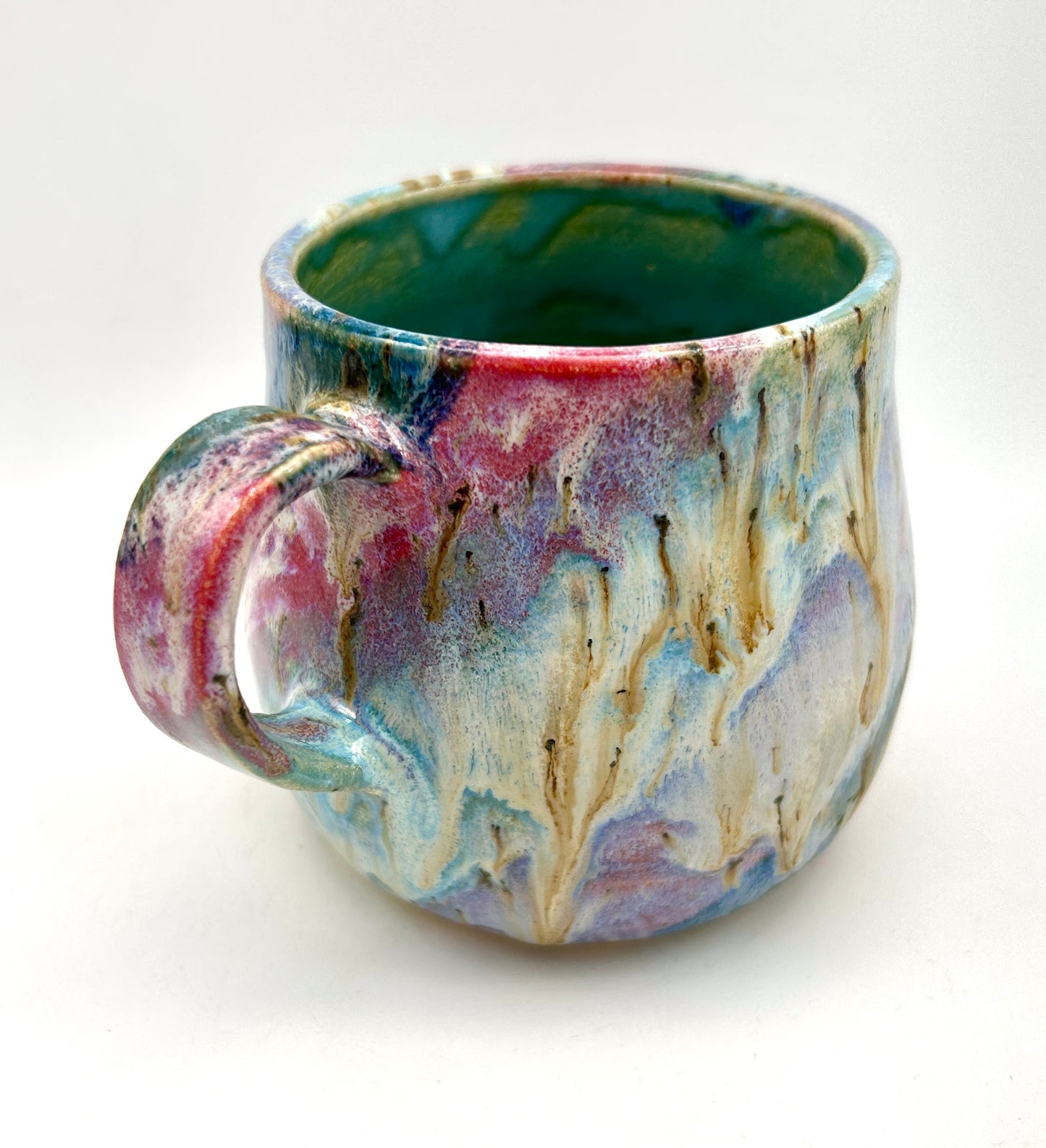 Small mug in my 'aurora' glaze combination