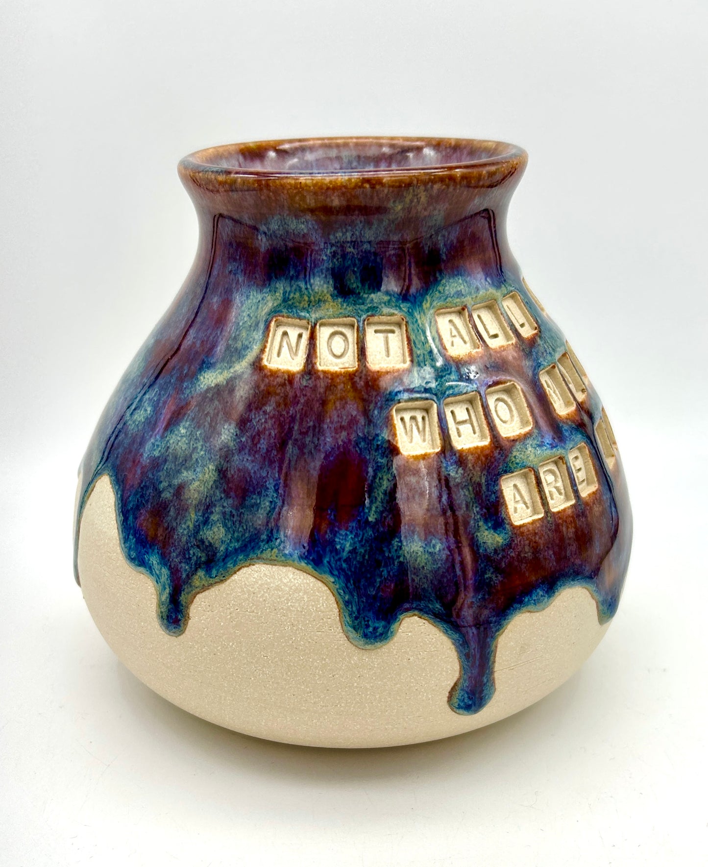 'Not all those who wander are lost' plump vase in 'heathery moors' glazes