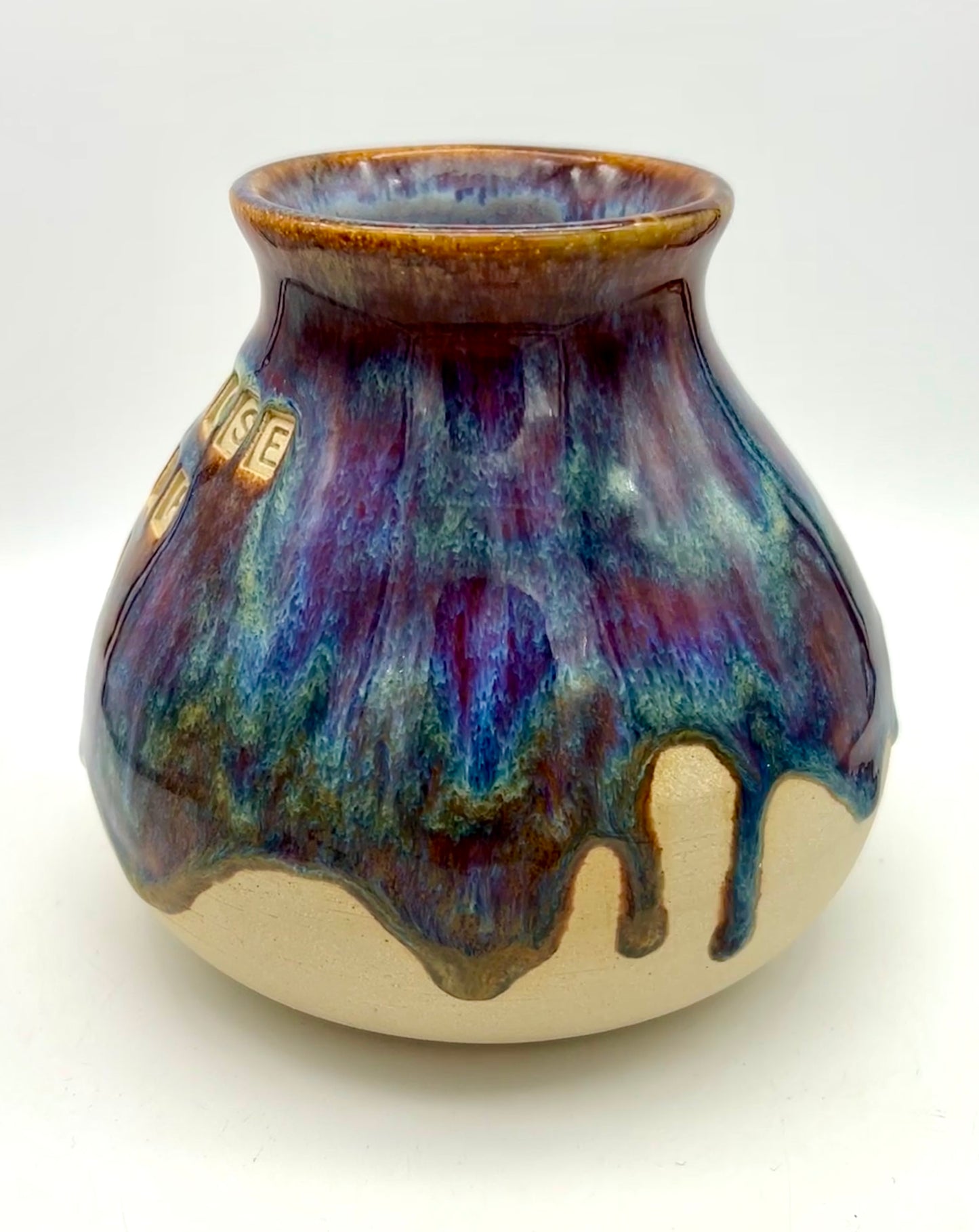 'Not all those who wander are lost' plump vase in 'heathery moors' glazes