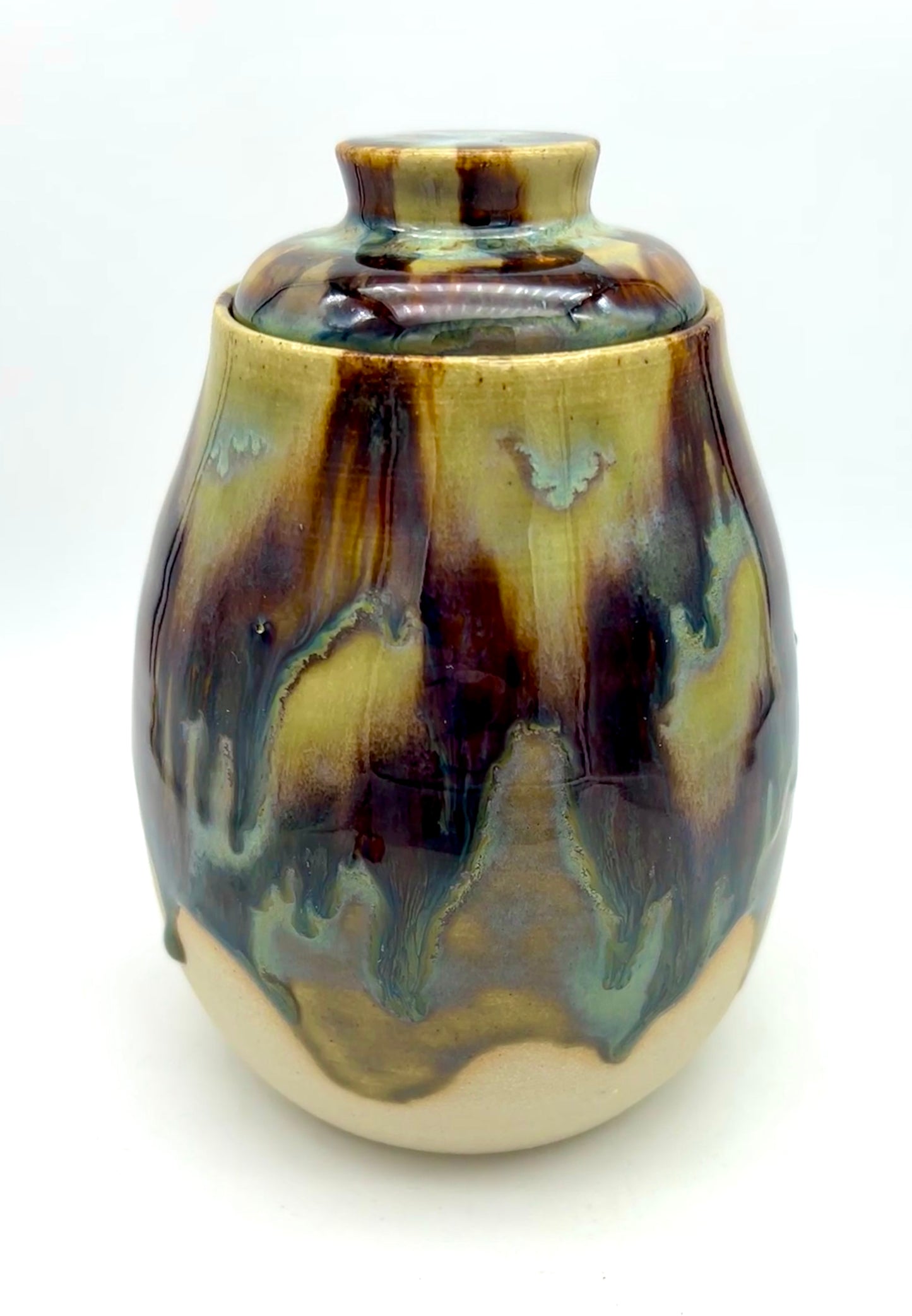 'Drugs' lidded pot in flowing 'aqua falls' glazes