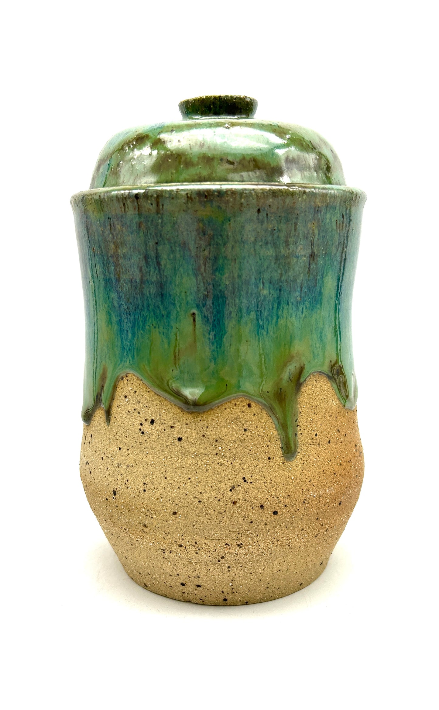 Tall 'drugs' jar in toasty clay glazed in flowing greens