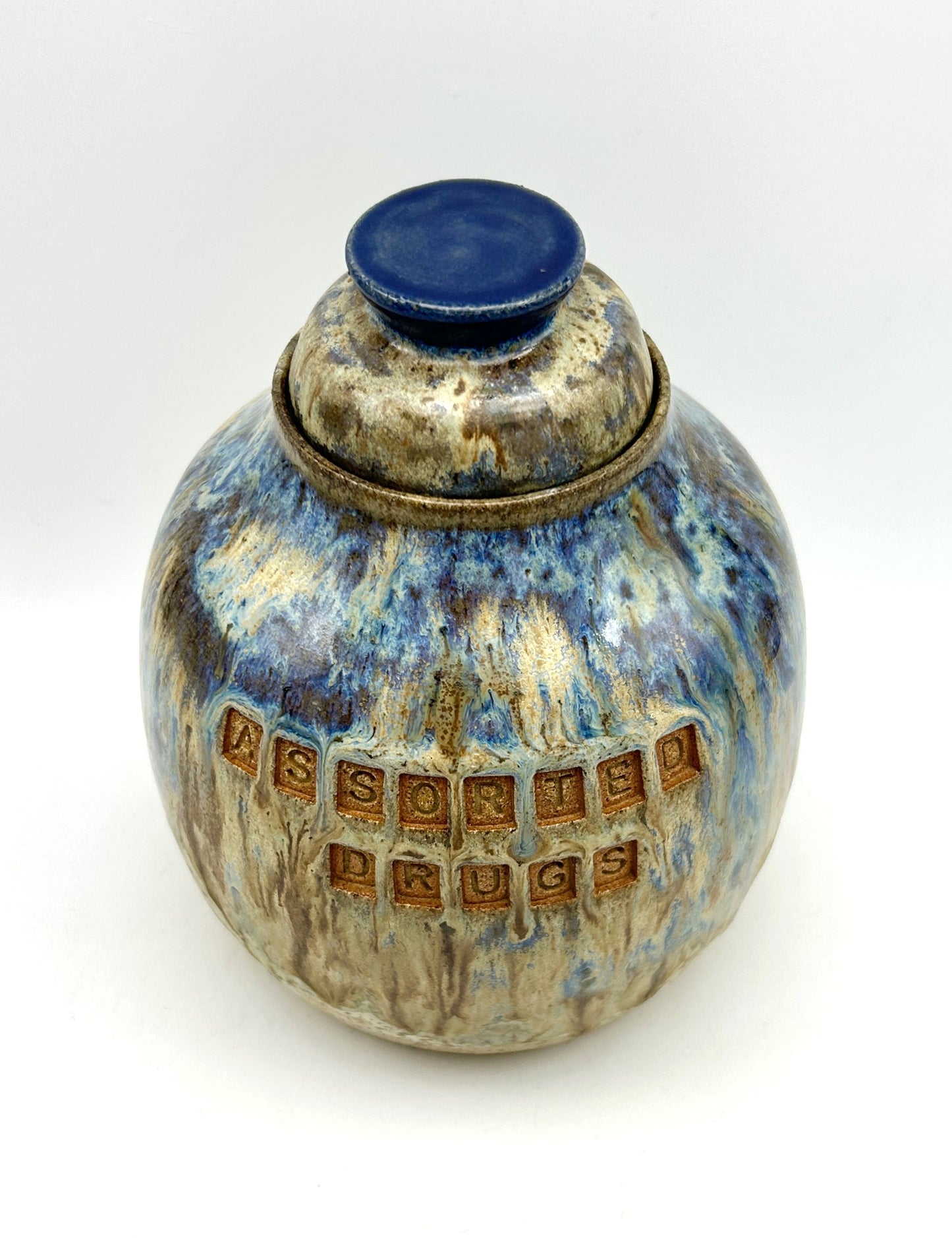 'Assorted drugs' plump lidded jar in toasty clay