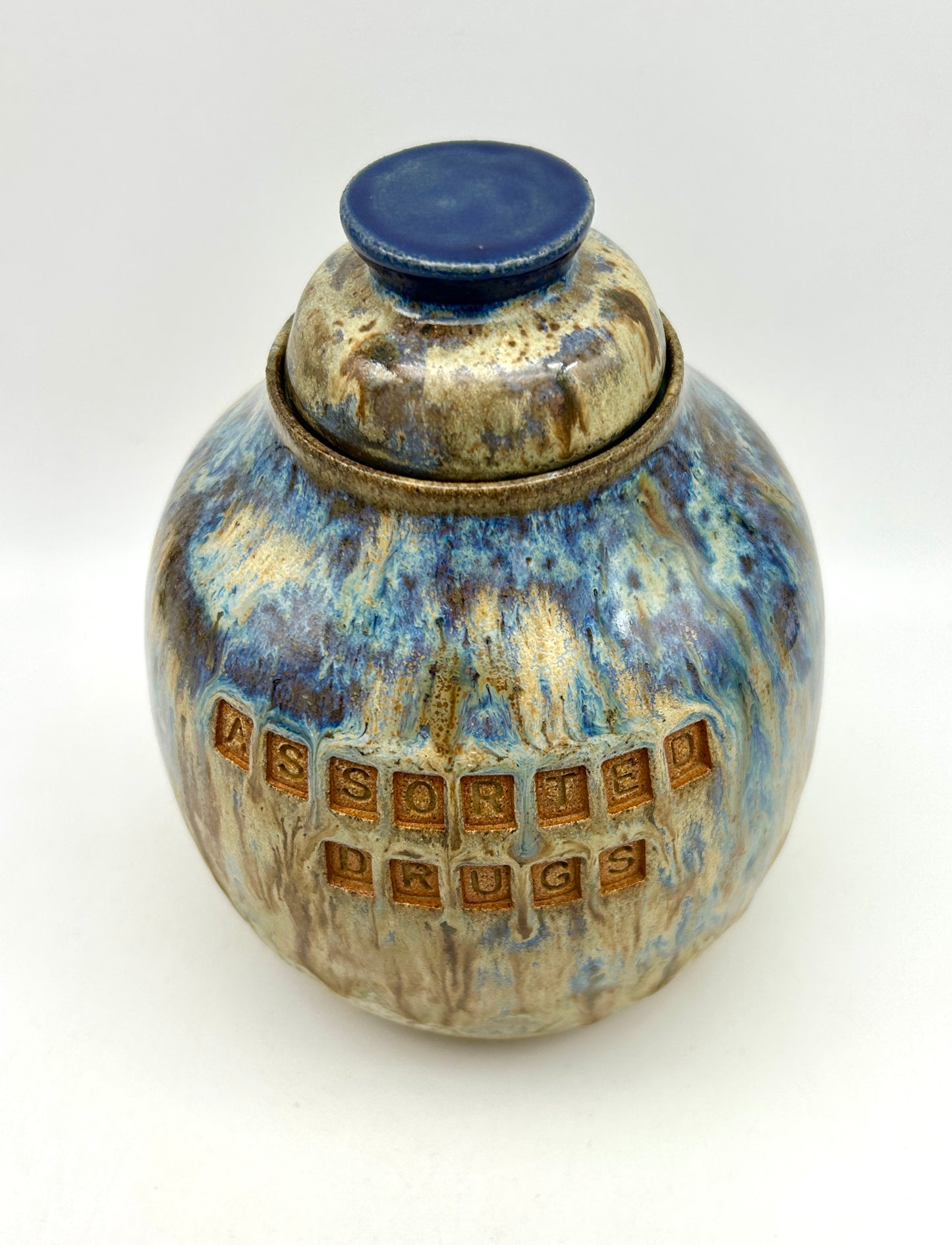 'Assorted drugs' plump lidded jar in toasty clay