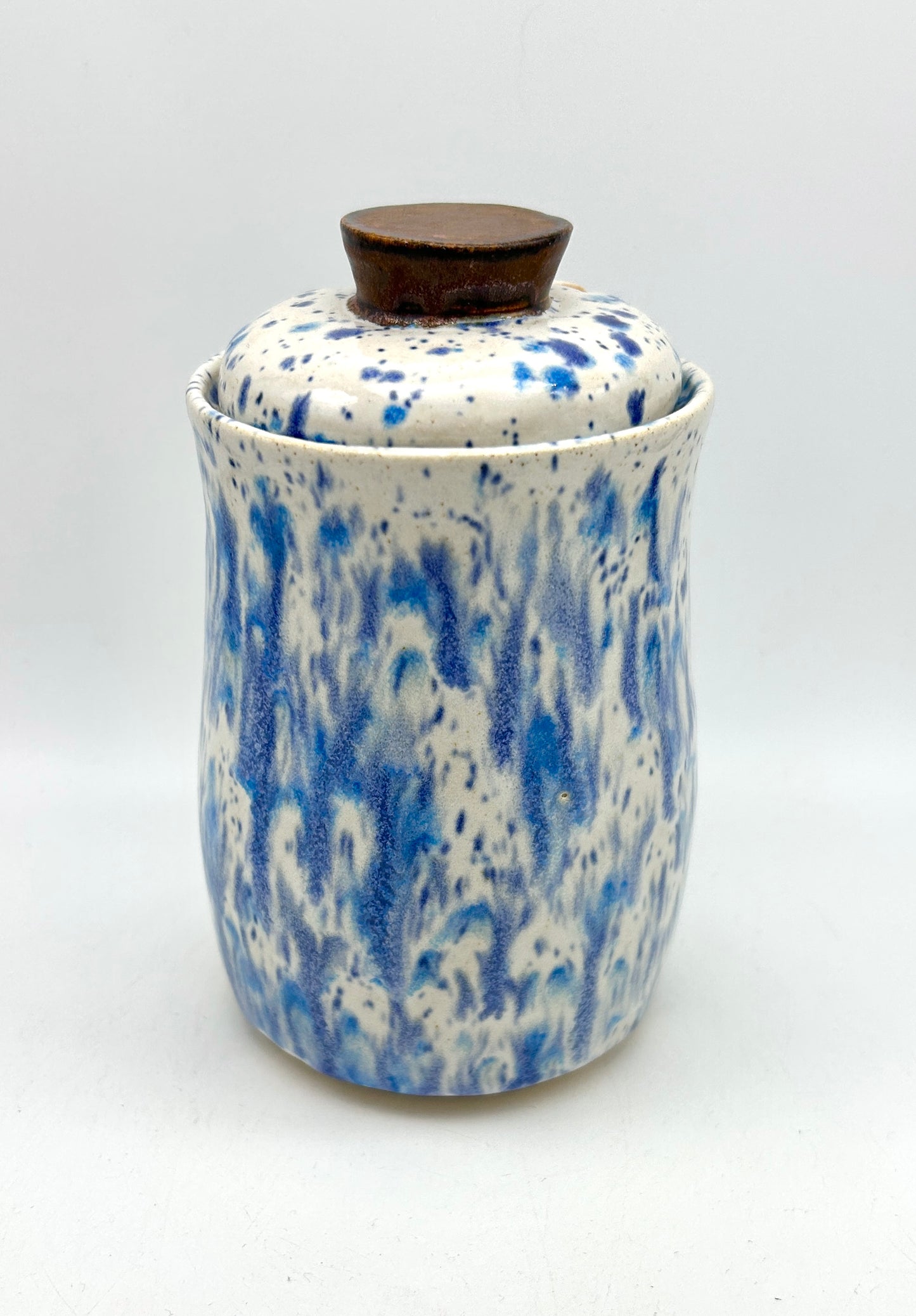 Small 'drugs' lidded jar in speckled blues