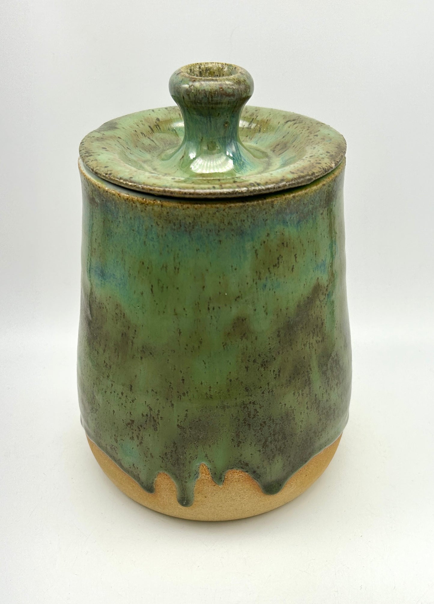 SECOND Tall lidded pot in toasty clay with green glazes