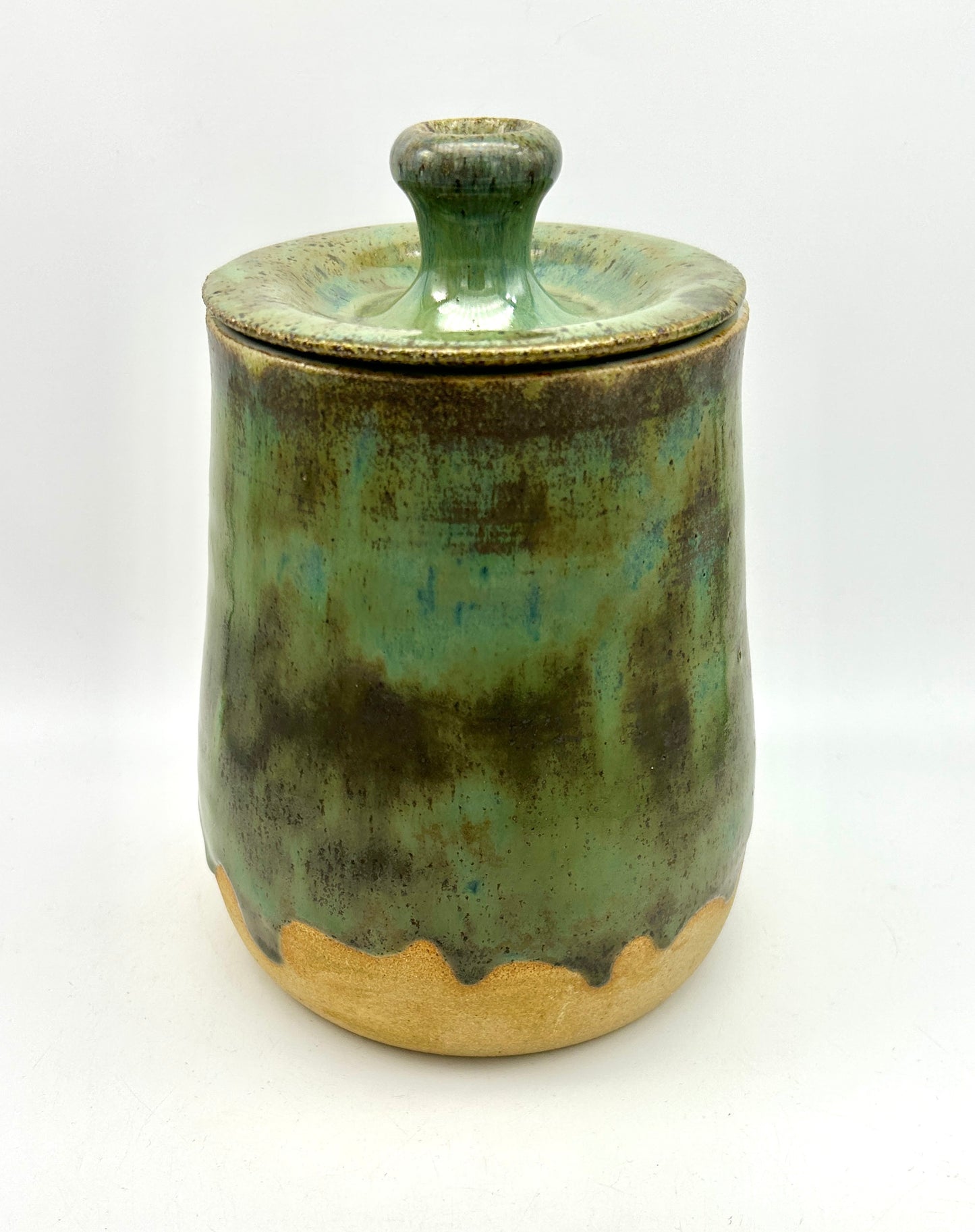 SECOND Tall lidded pot in toasty clay with green glazes