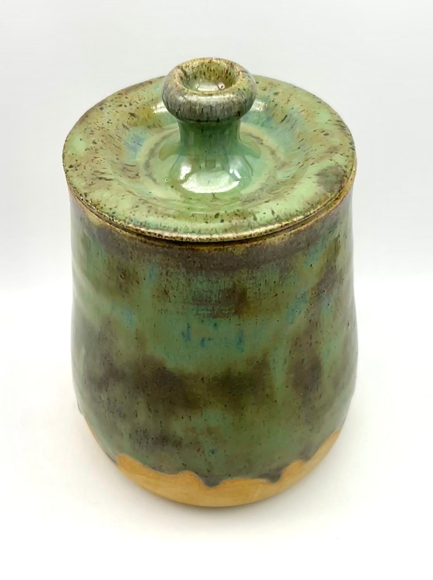 SECOND Tall lidded pot in toasty clay with green glazes