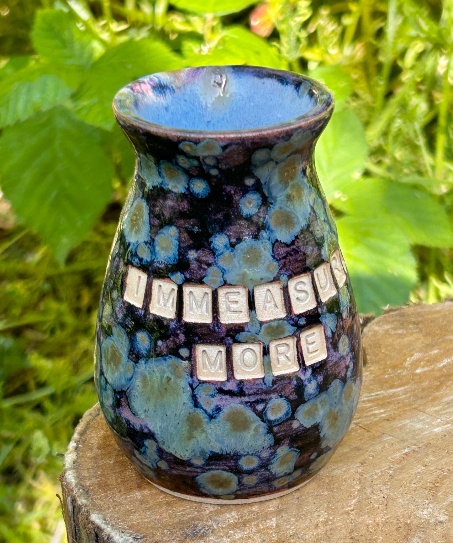 'Immeasurably more' bud vase in galaxy glazes